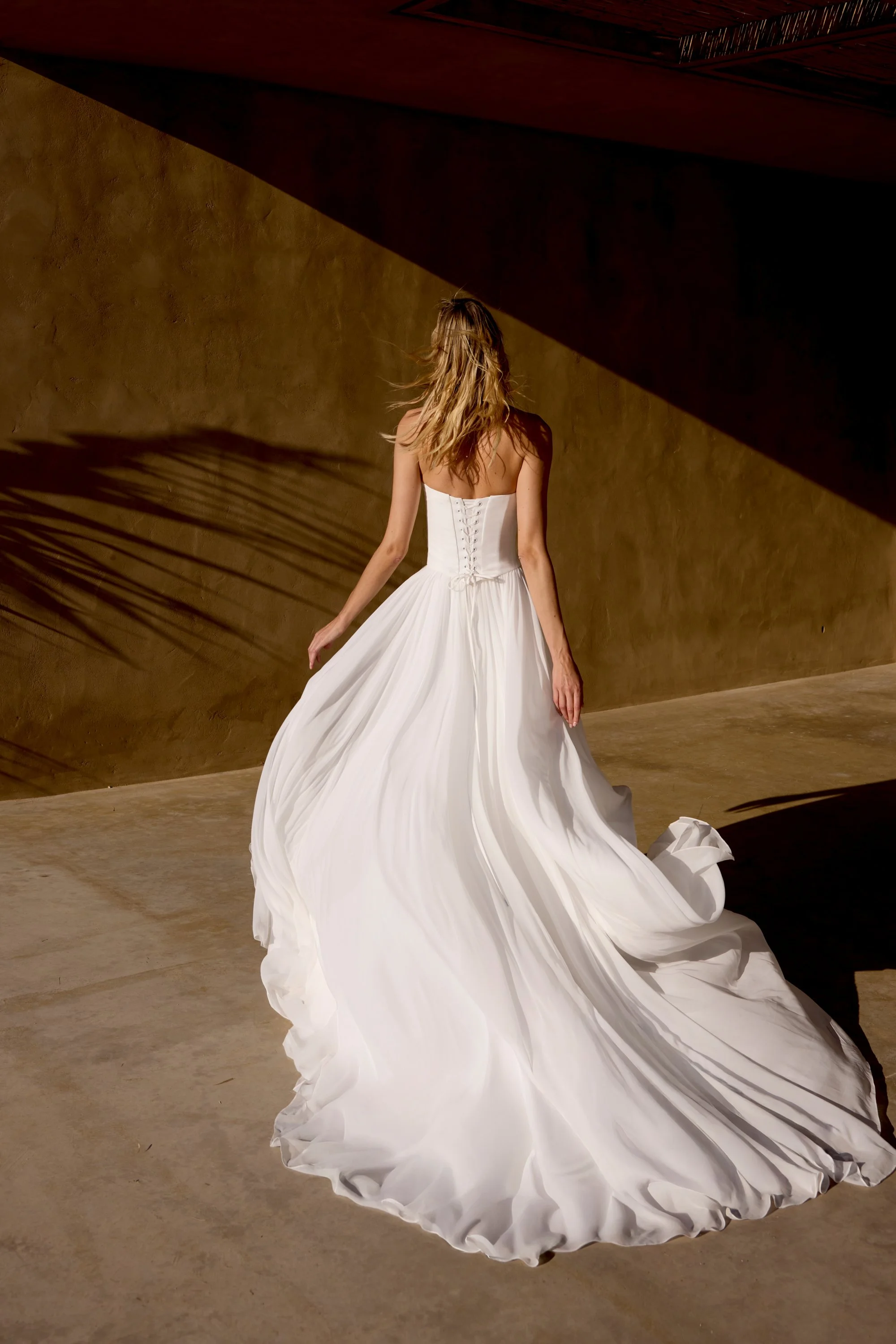 Chiffon Lillian West Wedding dress with flowing skirt