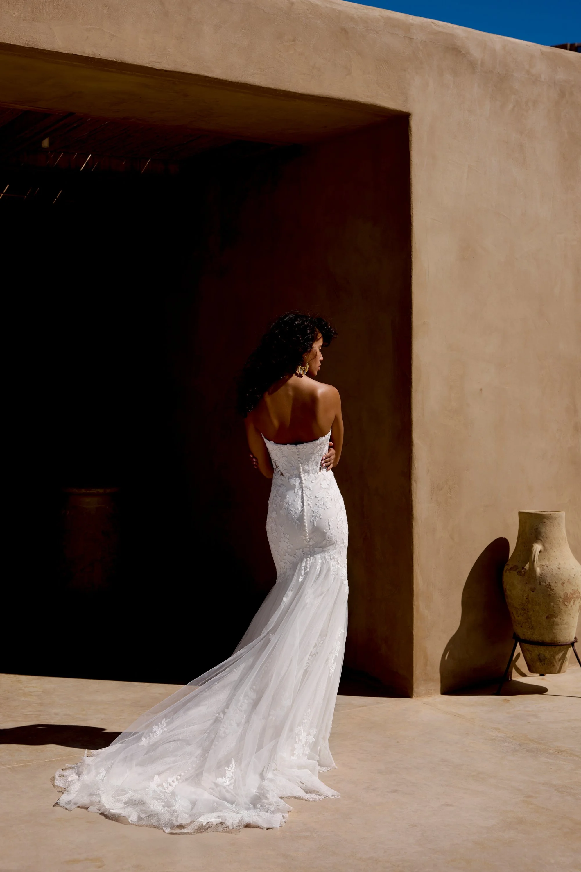 lace and tulle Lillian West fitted wedding gown with floral appliques and sheer cutouts on the bodice