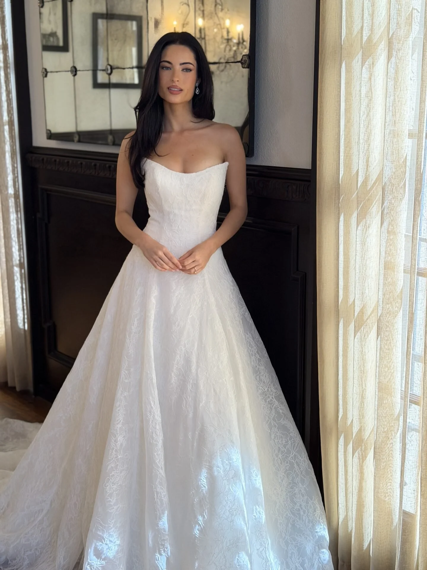 All-lace infinity waist Essense of Australia wedding gown with cat eye neckline.