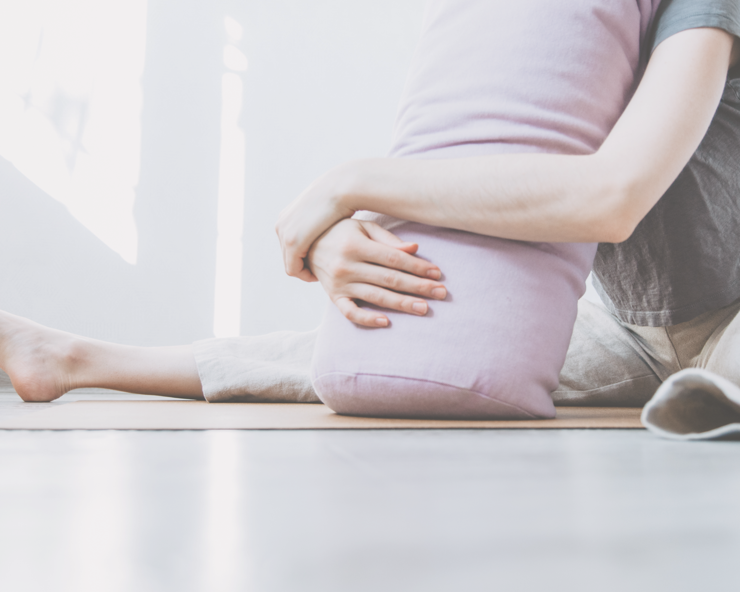 Yin Yoga with soft pastel props. Embodied. Rested. Calm