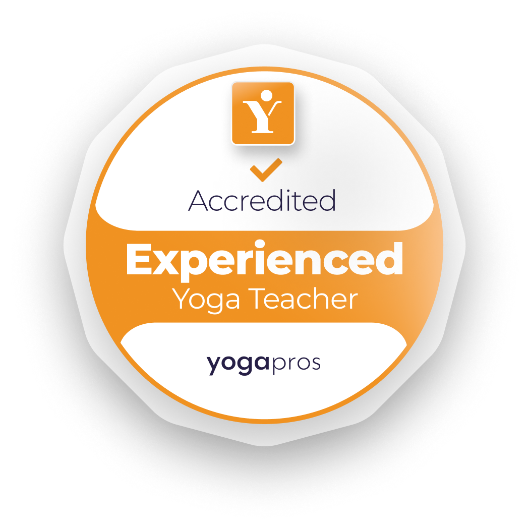 Badge from Yoga Pro with an orange and white design, stating 'Accredited Experienced Yoga Teacher' with the YogaPro logo at the bottom.