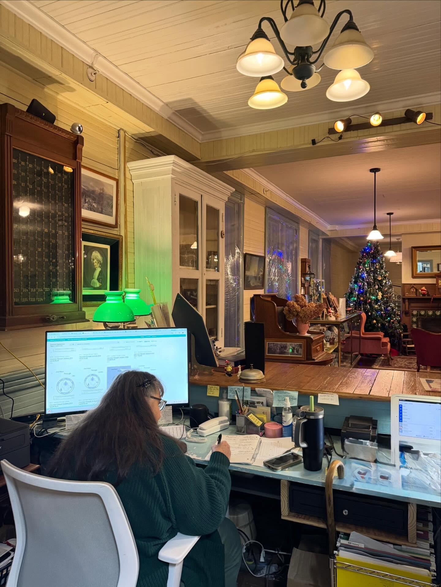 Evenings at the inn: warm lights, quiet work, and Christmas cheer in every corner. Make sure to stop by for the lights, cookies, and hot chocolate for a classic country Christmas.
