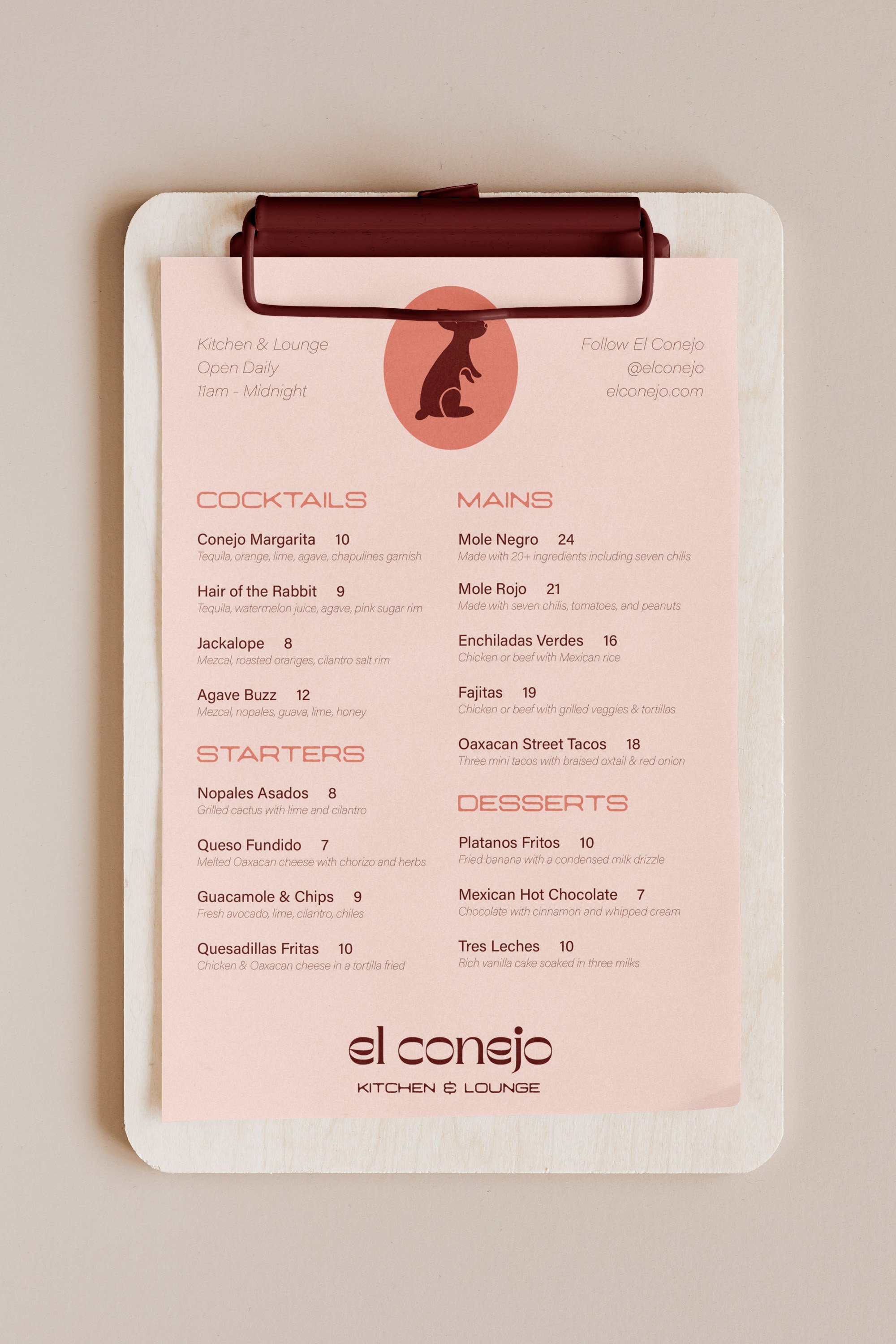A branded El Conejo restaurant menu design on a sophisticated clipboard.