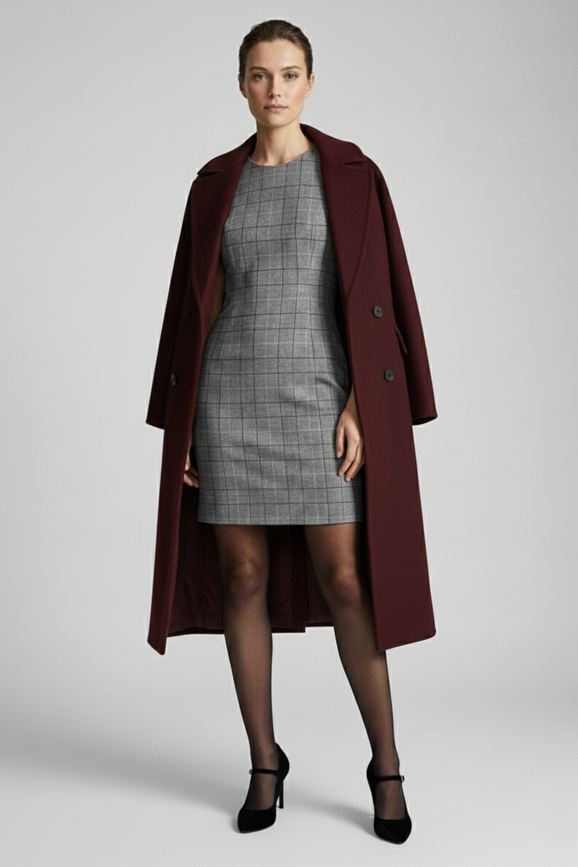 Model wearing black and white checkered dress