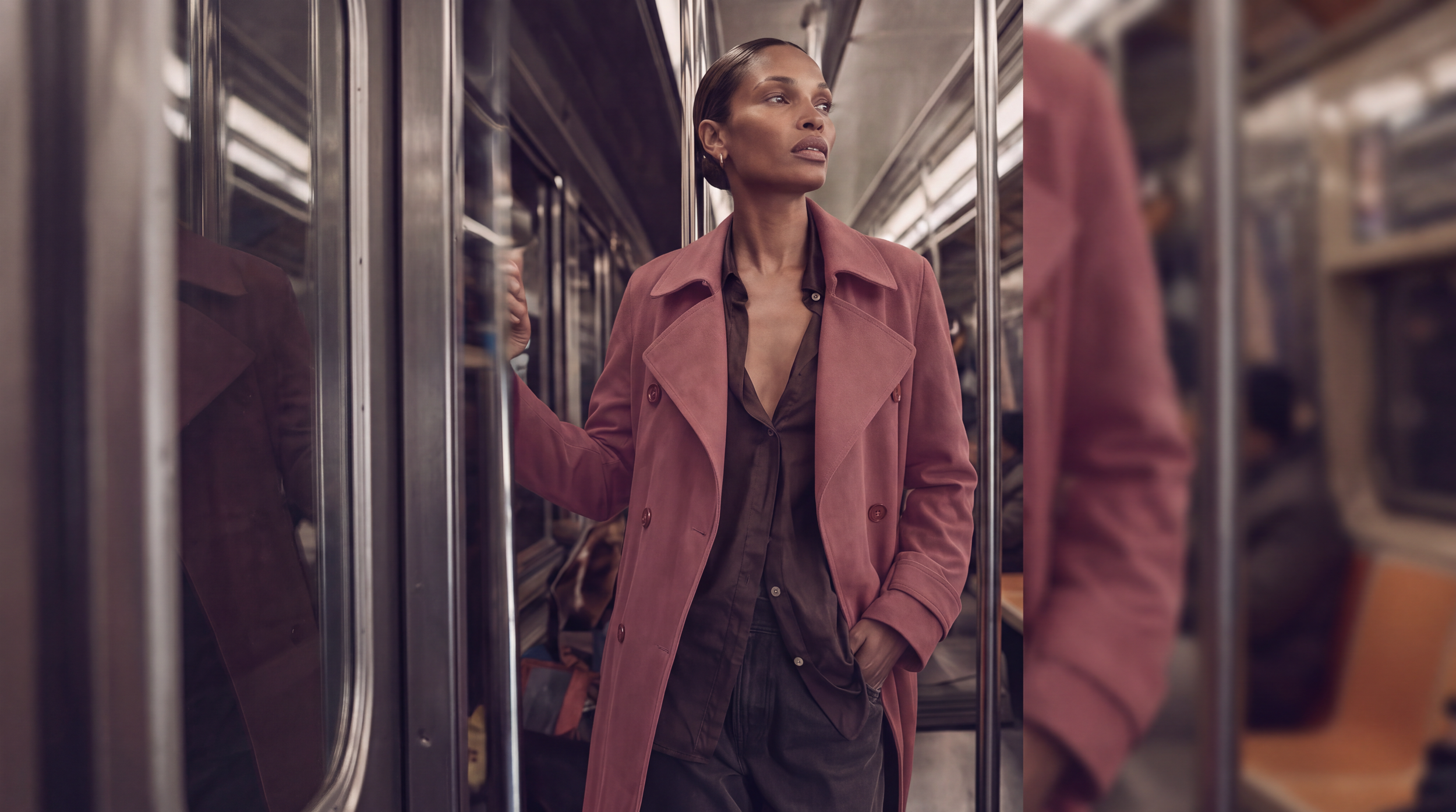 Model wearing olive green trench coat