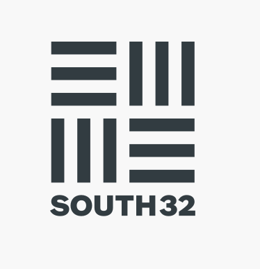 South32 logo with stylized black geometric symbols above the text.