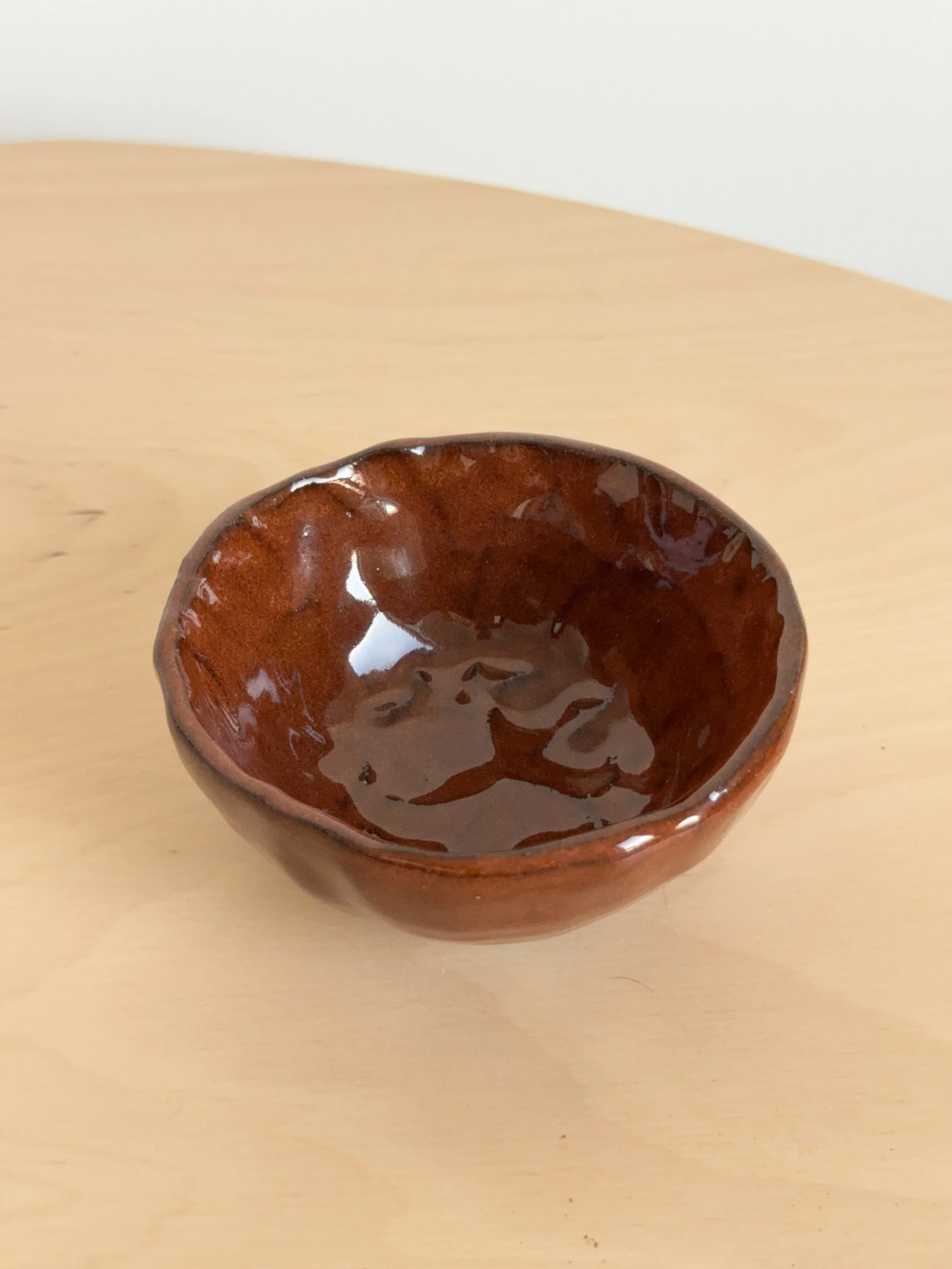 pinch bowl rust glaze inside .JPG