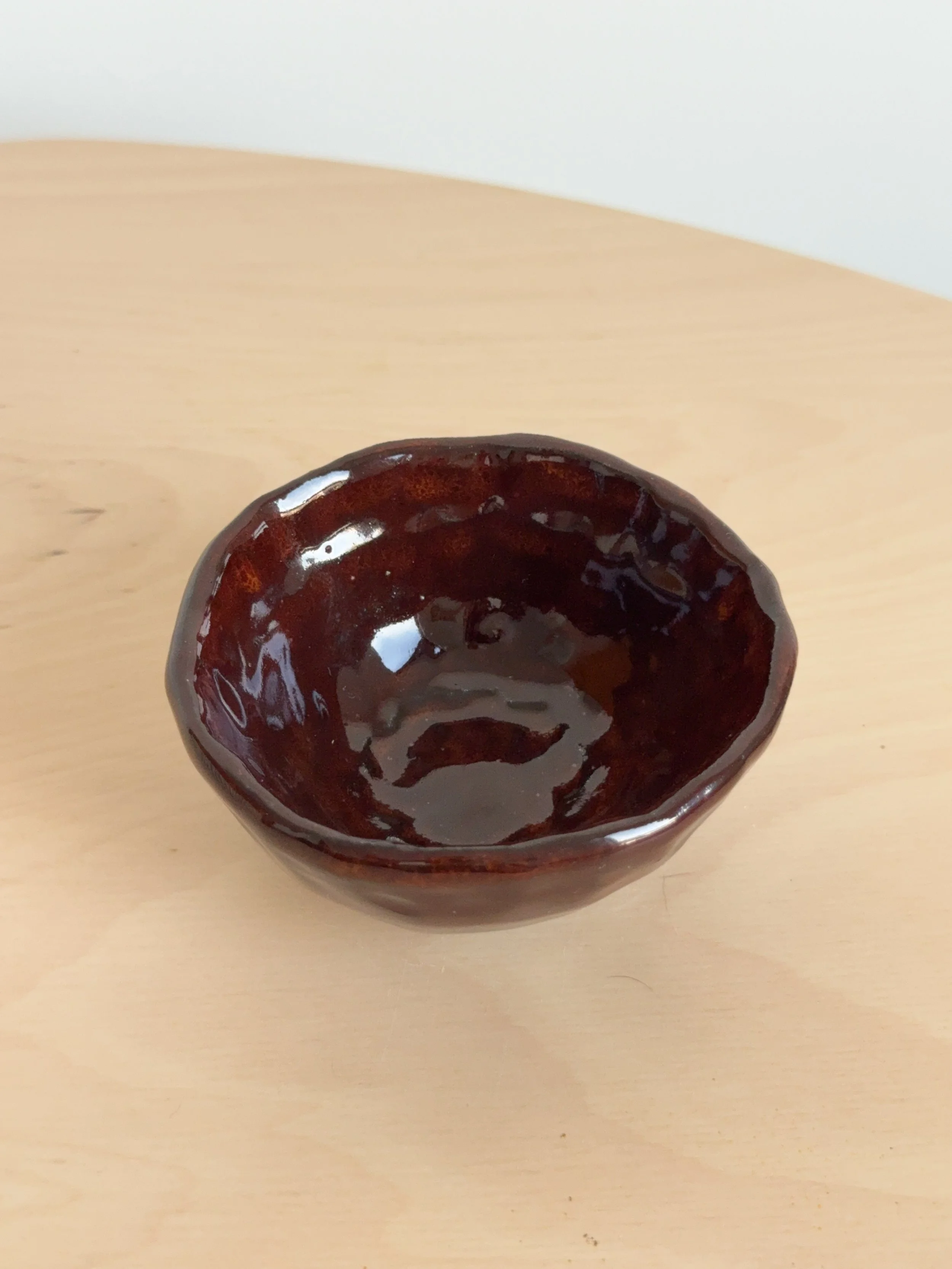 pinch bowl crimson glaze inside .JPG