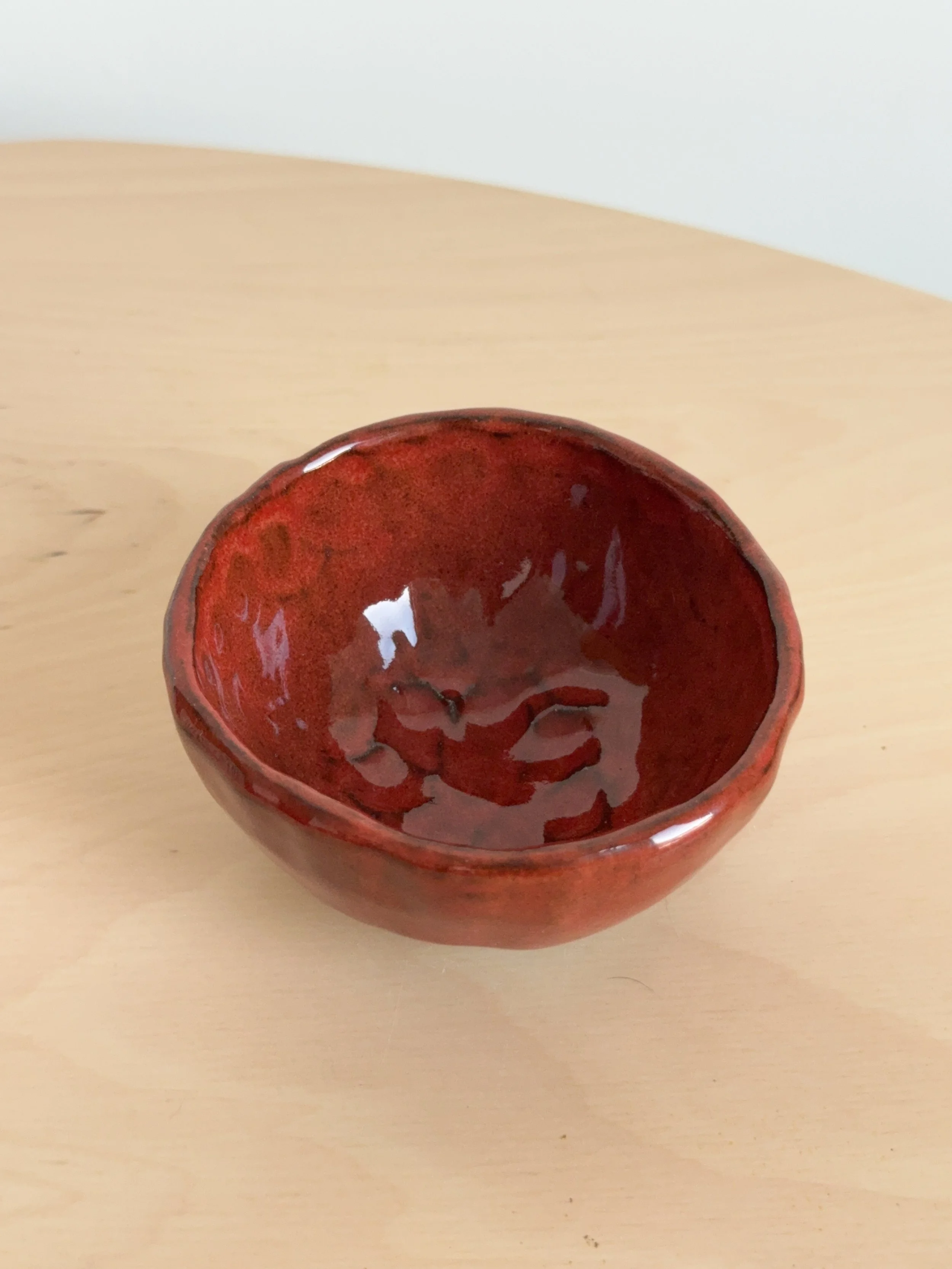 pinch bowl carnelian glaze inside .JPG