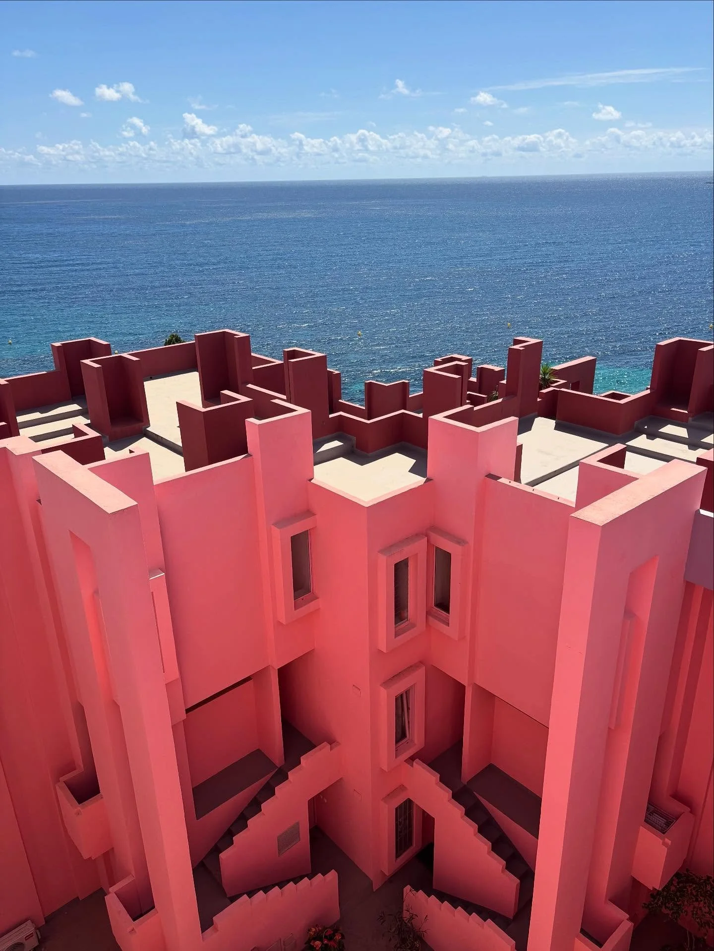 🌹 Time to paint the town red 🌹

Welcome to La Muralla Roja - A beautiful example of postmodern architecture nestling deep between the sea and sky of Costa Blanca, Spain. 

Created by the architect Ricardo Bofill for his client Palomar SA and fully 