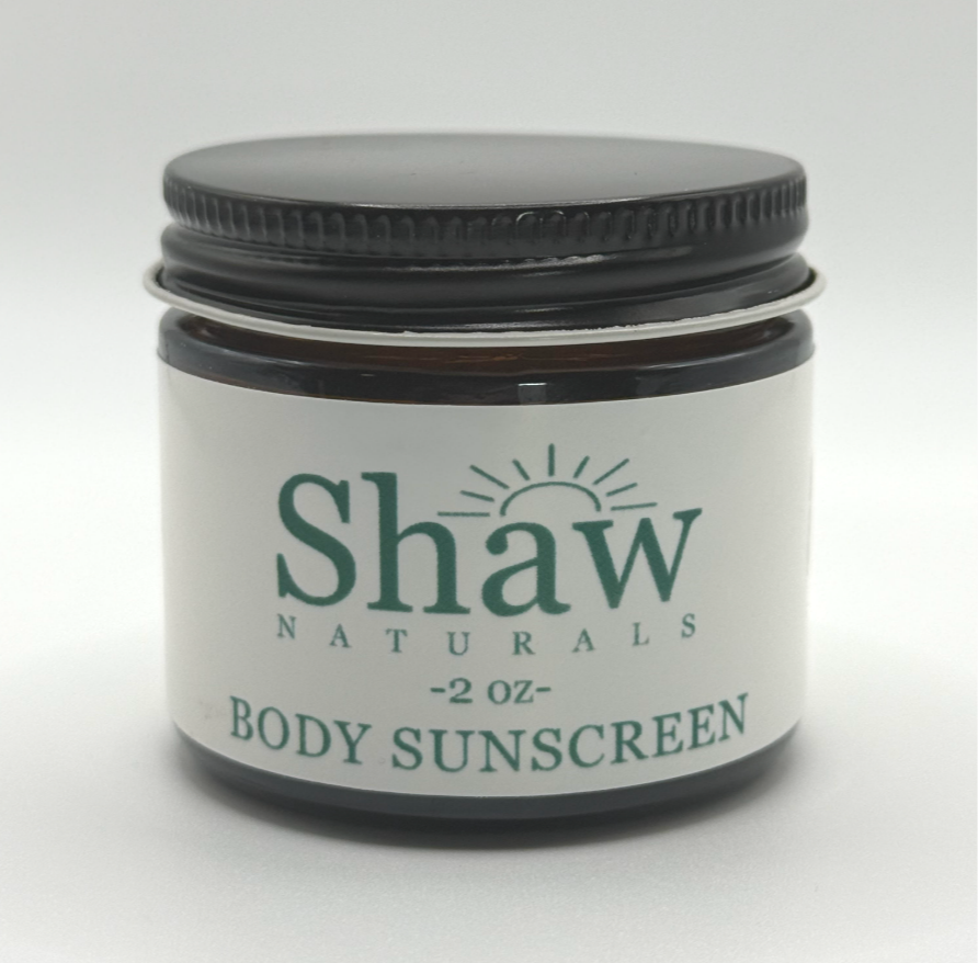 Shaw Naturals Tallow Body Sunscreen in a 2 oz amber glass jar, front label