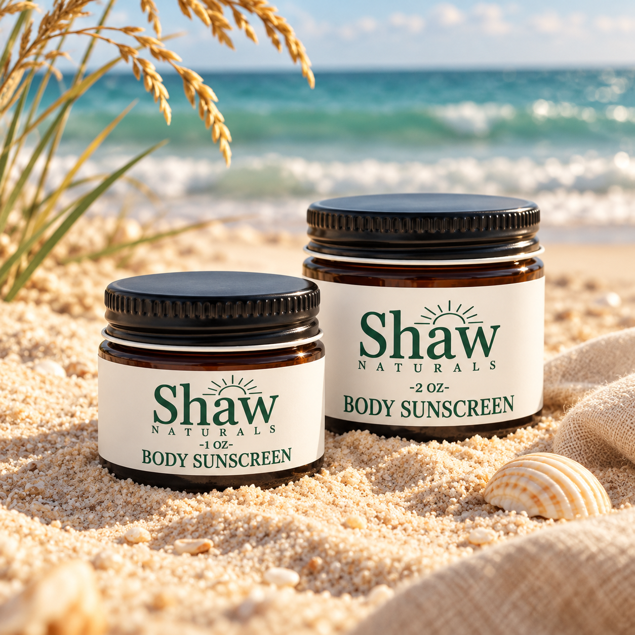 Amber sunscreen jars in coastal sand-1.png