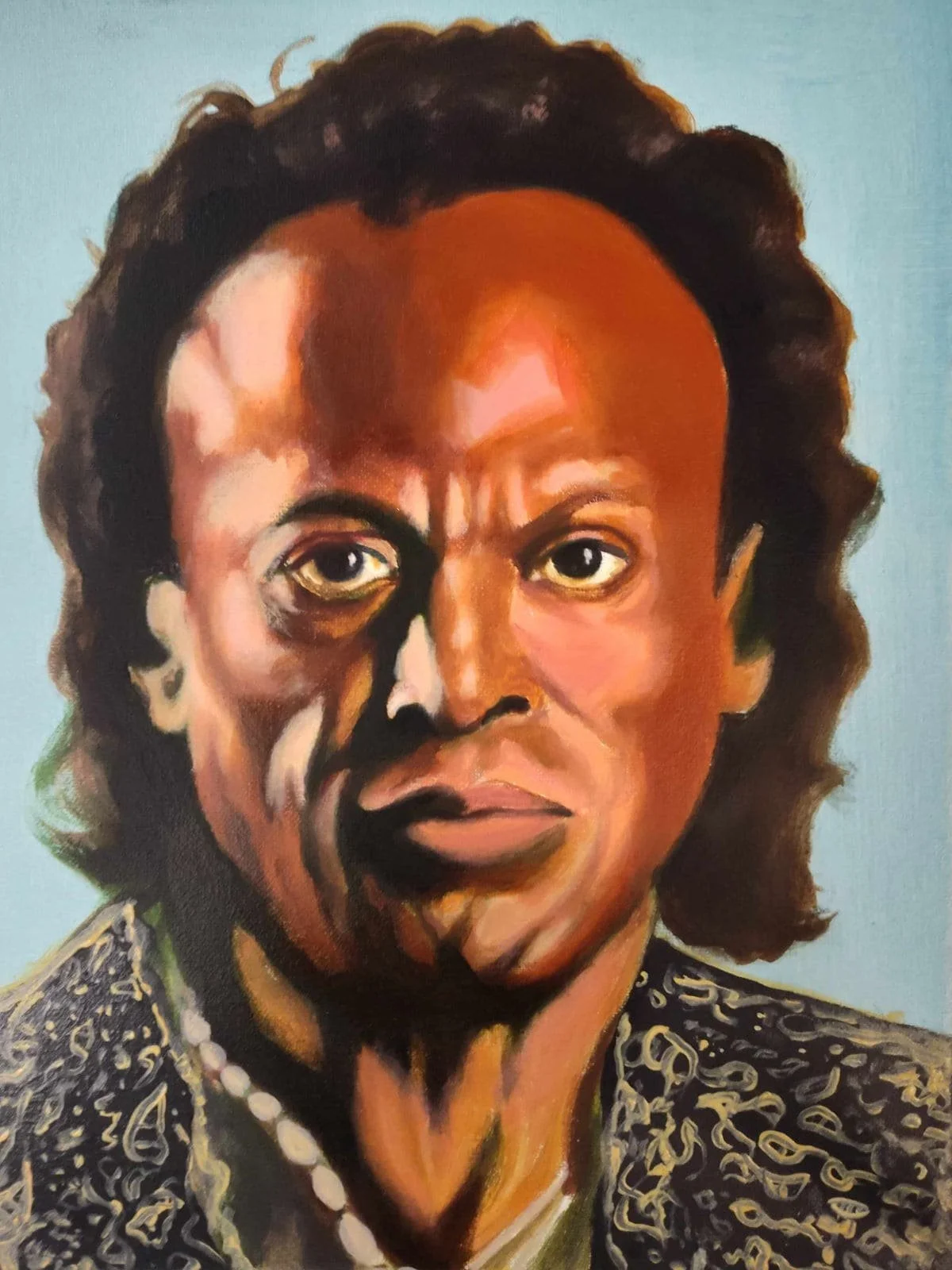 An oil painting on canvas of famous trumpet player Miles Davis.