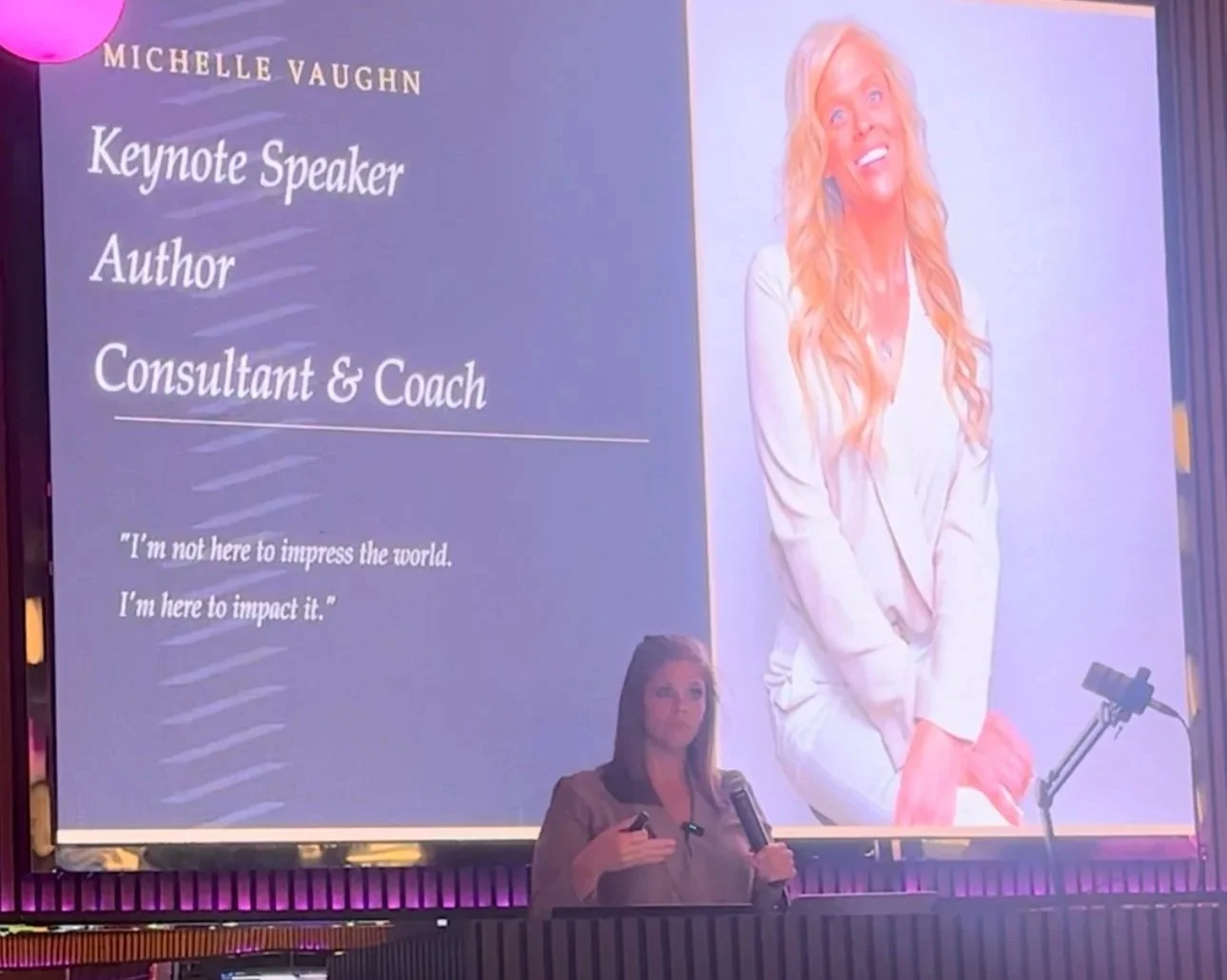 A hand holding a torn piece of paper that says 'to inspire,' representing daily motivational content for personal growth