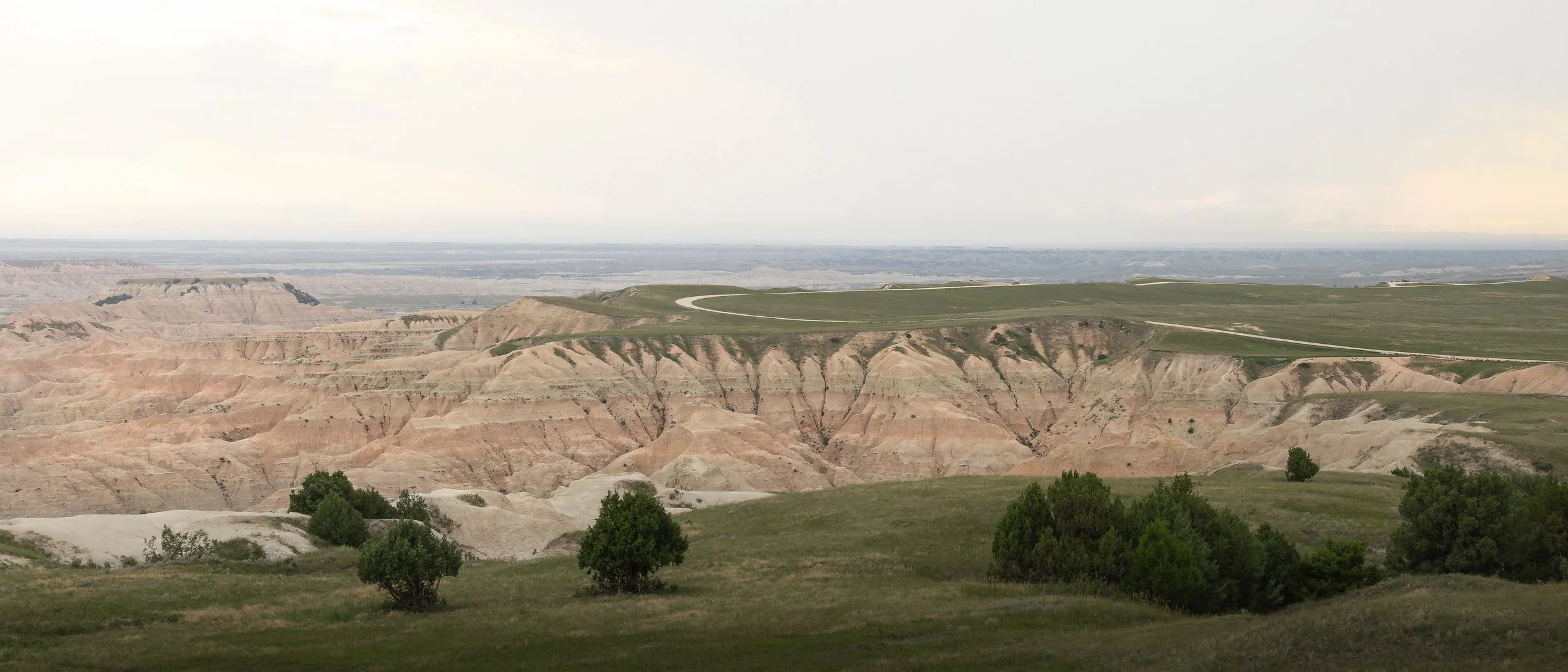 Windy road along a cliffs edge in the Badlands