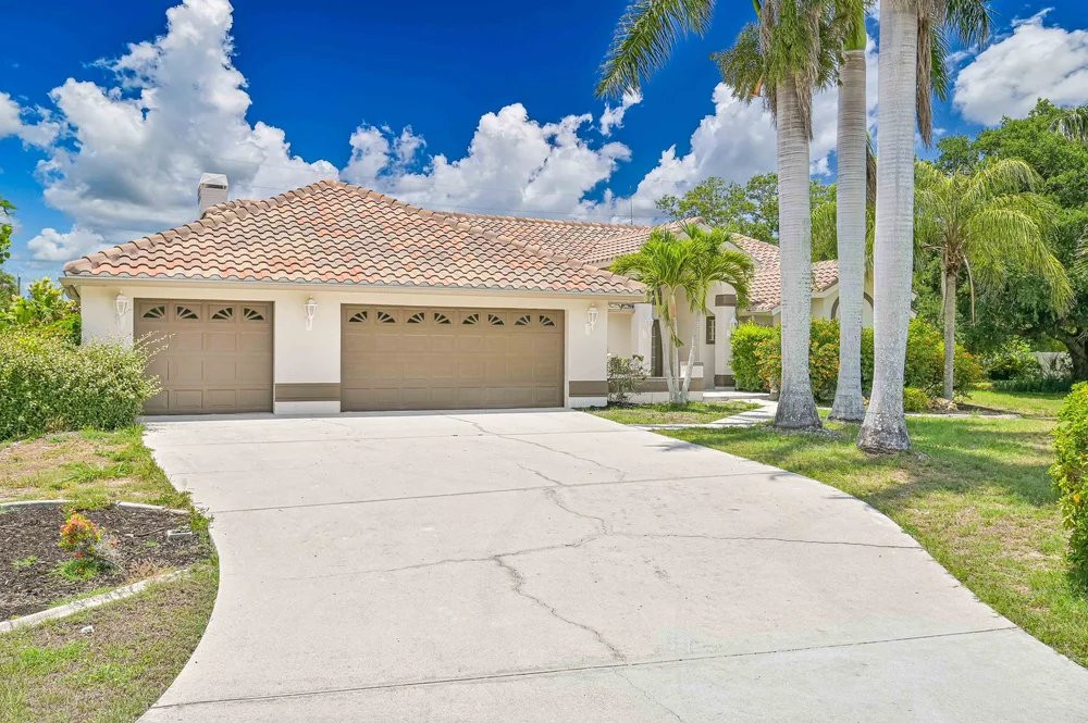 Exterior painting on Florida stucco home - Naples FL