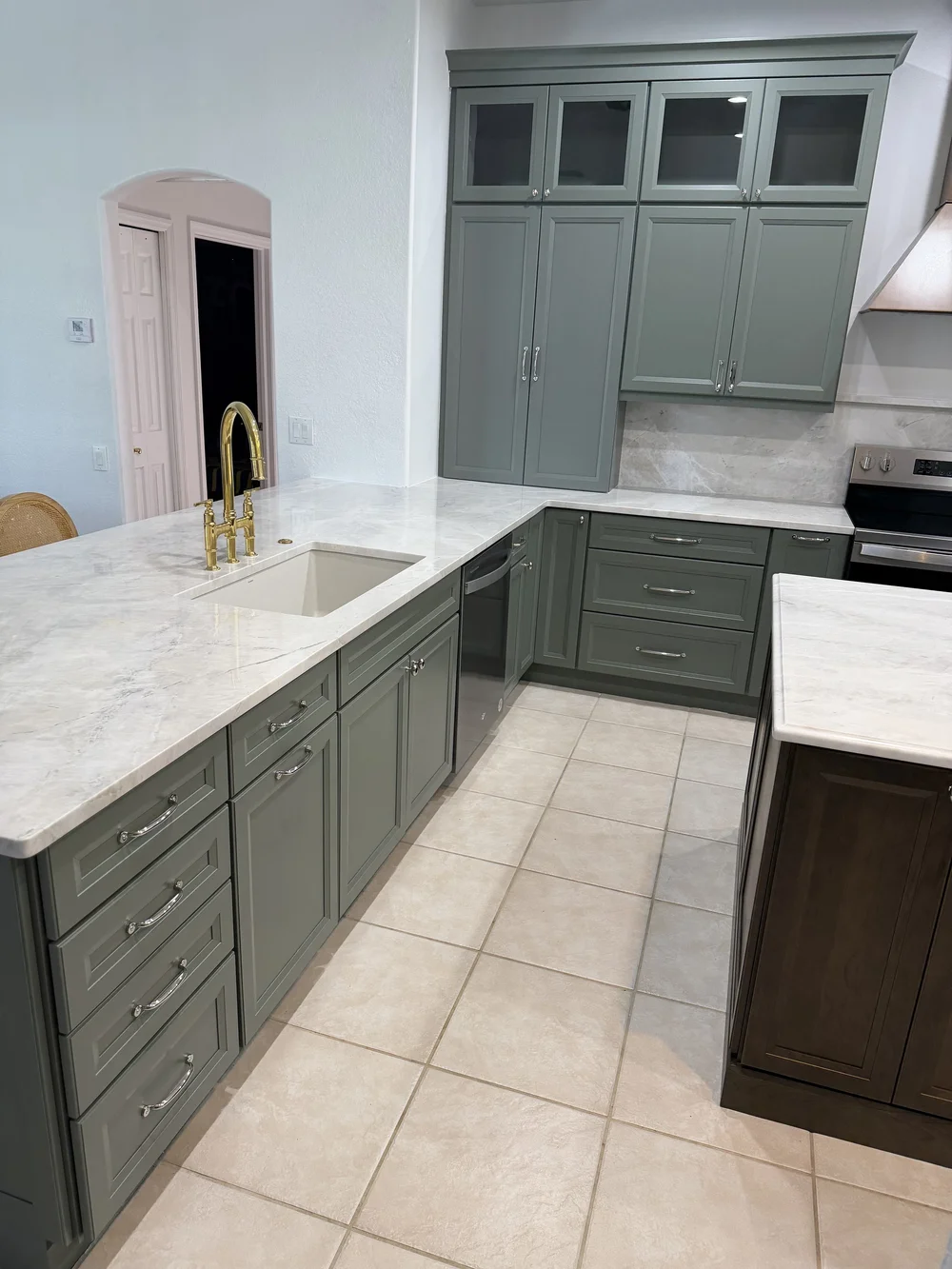 Kitchen remodel with quartz counters and brass fixtures - Southwest Florida