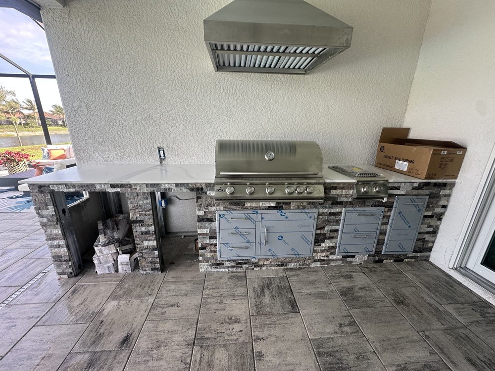 In Progress: Stacked stone and natural stone counters installed - Southwest Florida