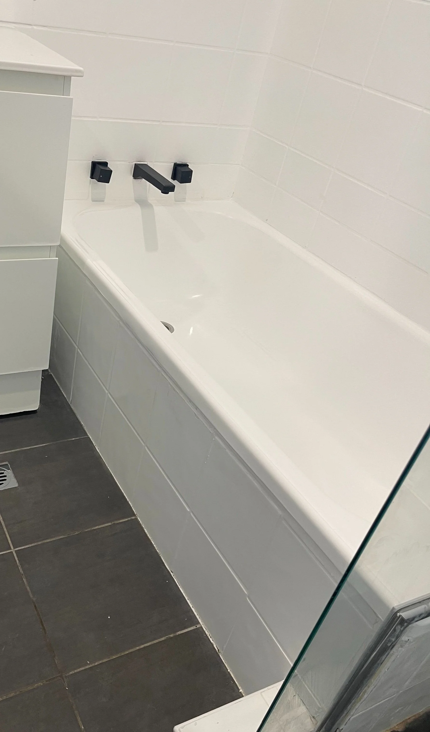 Fresh white resurfaced basin in a Sydney home