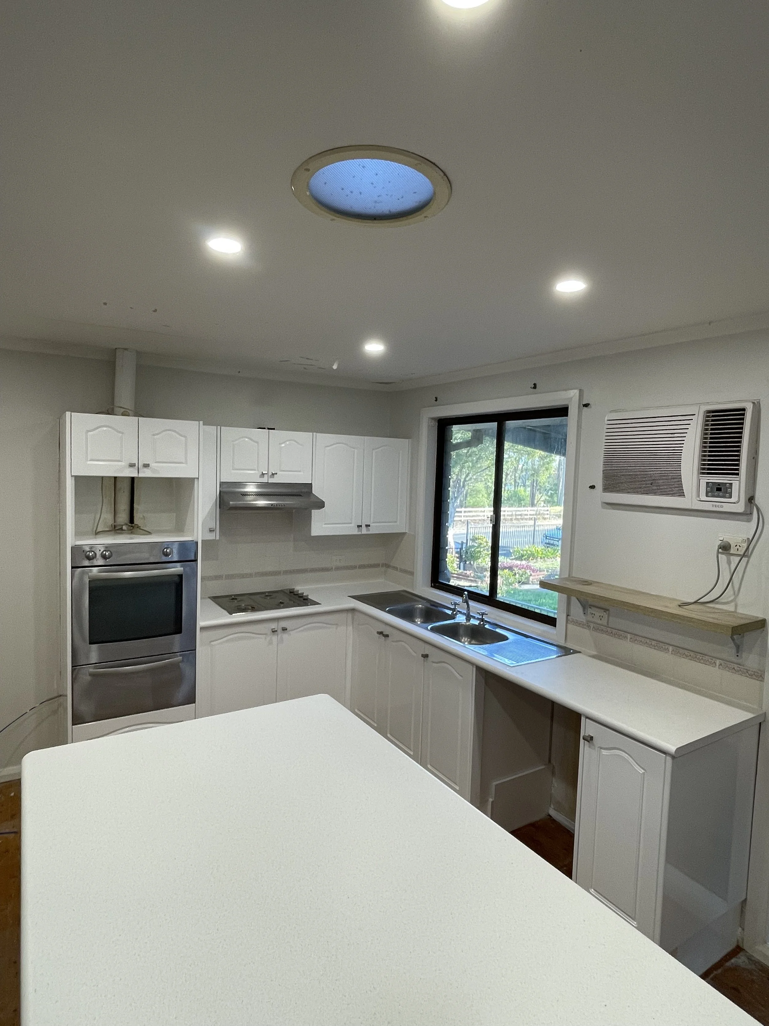 Kitchen resurfacing, benchtop resurfacing by SDR Renovations in Sydney