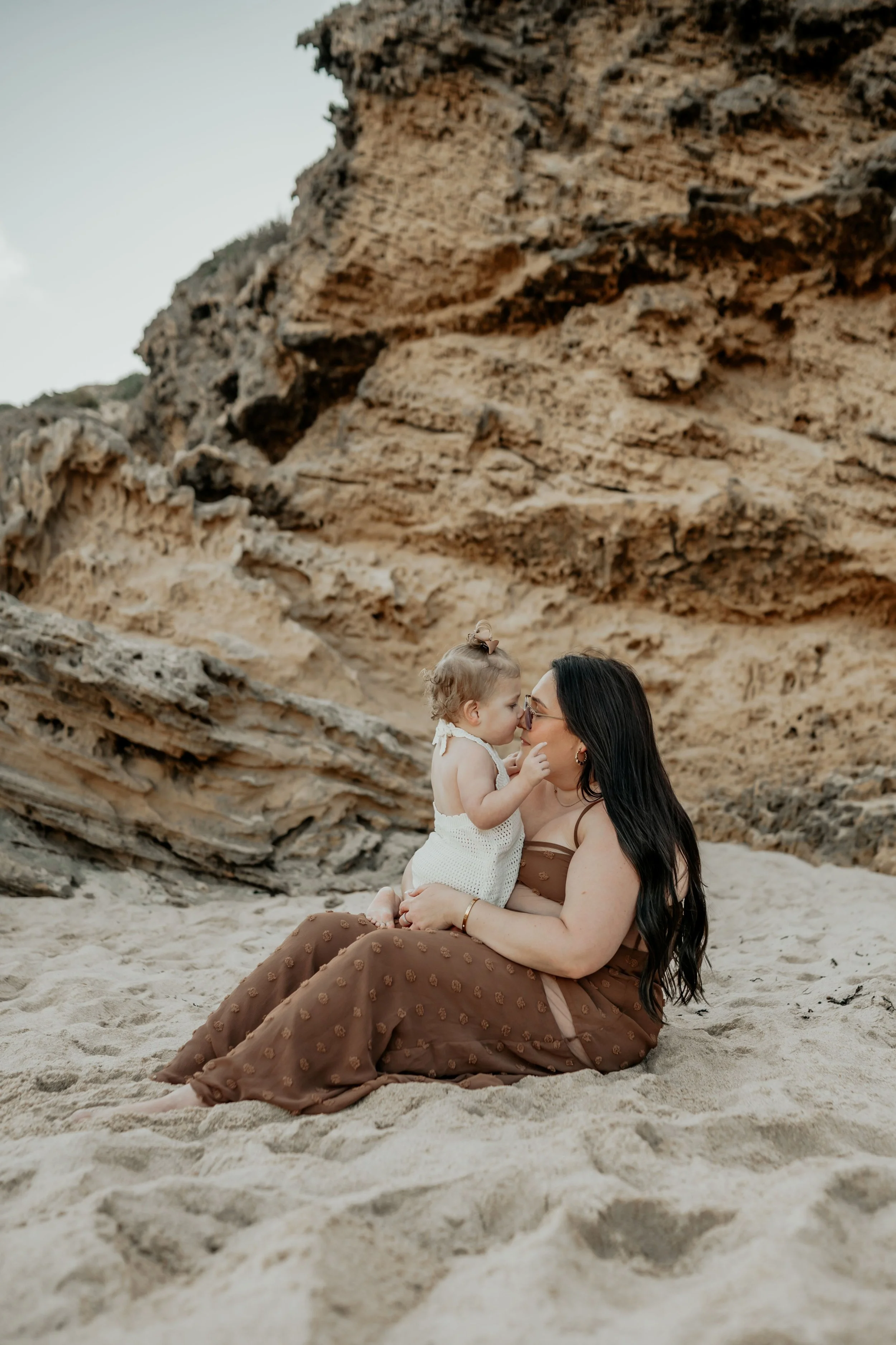 A mother and daughter share a quiet moment of love 