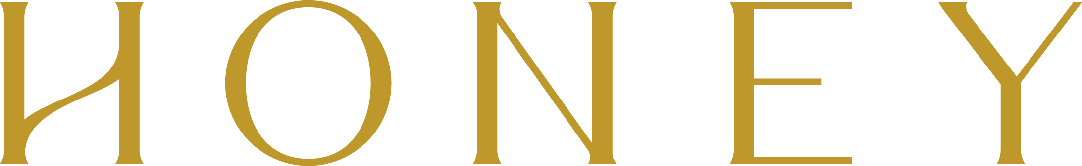 Hueman Honey word mark. The word 'HONEY' written in large gold letters.