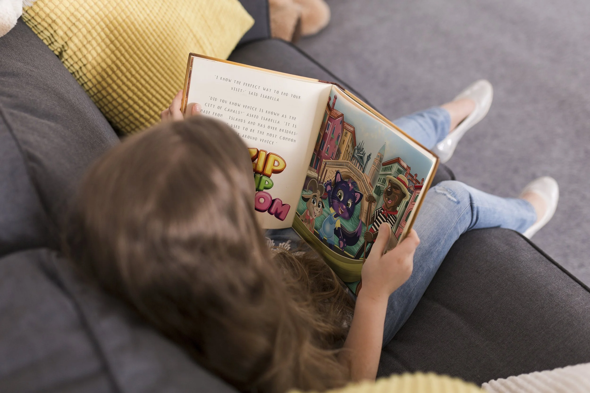 girl-reading-book-couch.jpg