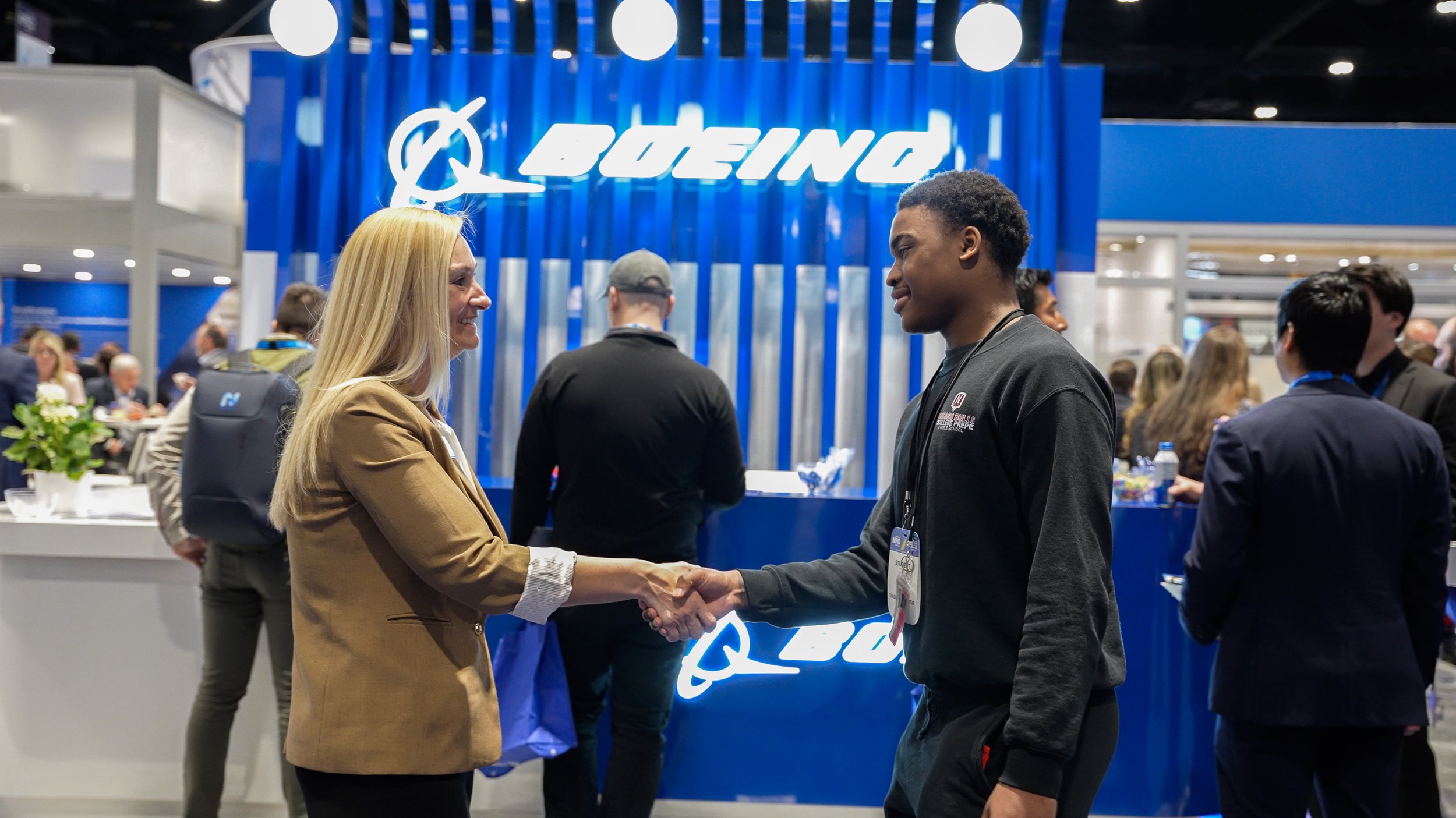 Boeing Jennifer Shaking Hands with Student.jpg