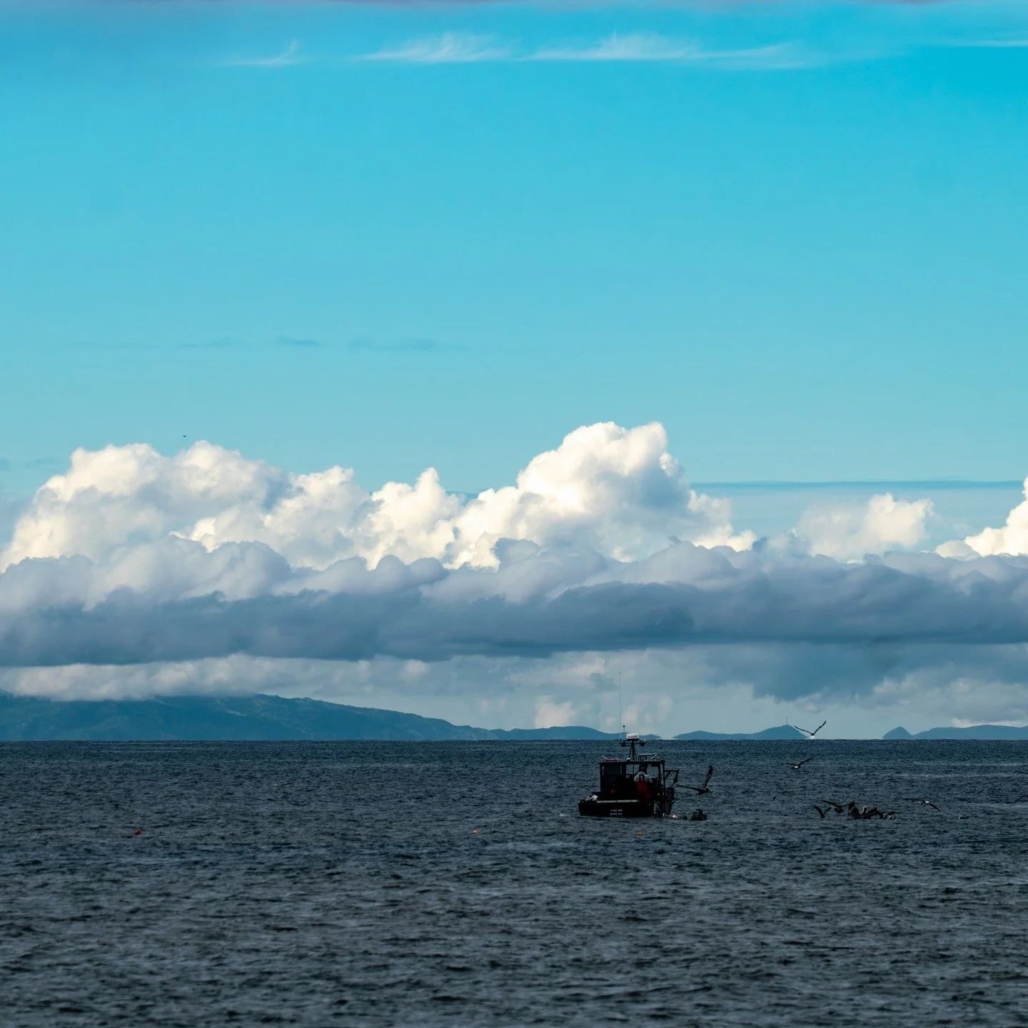 There is something deeply reassuring about a single vessel moving across open water. It signals direction, steadiness, and trust in the journey ahead.

This photograph captures a quiet moment at sea where sky, water, and movement exist in balance. Ps