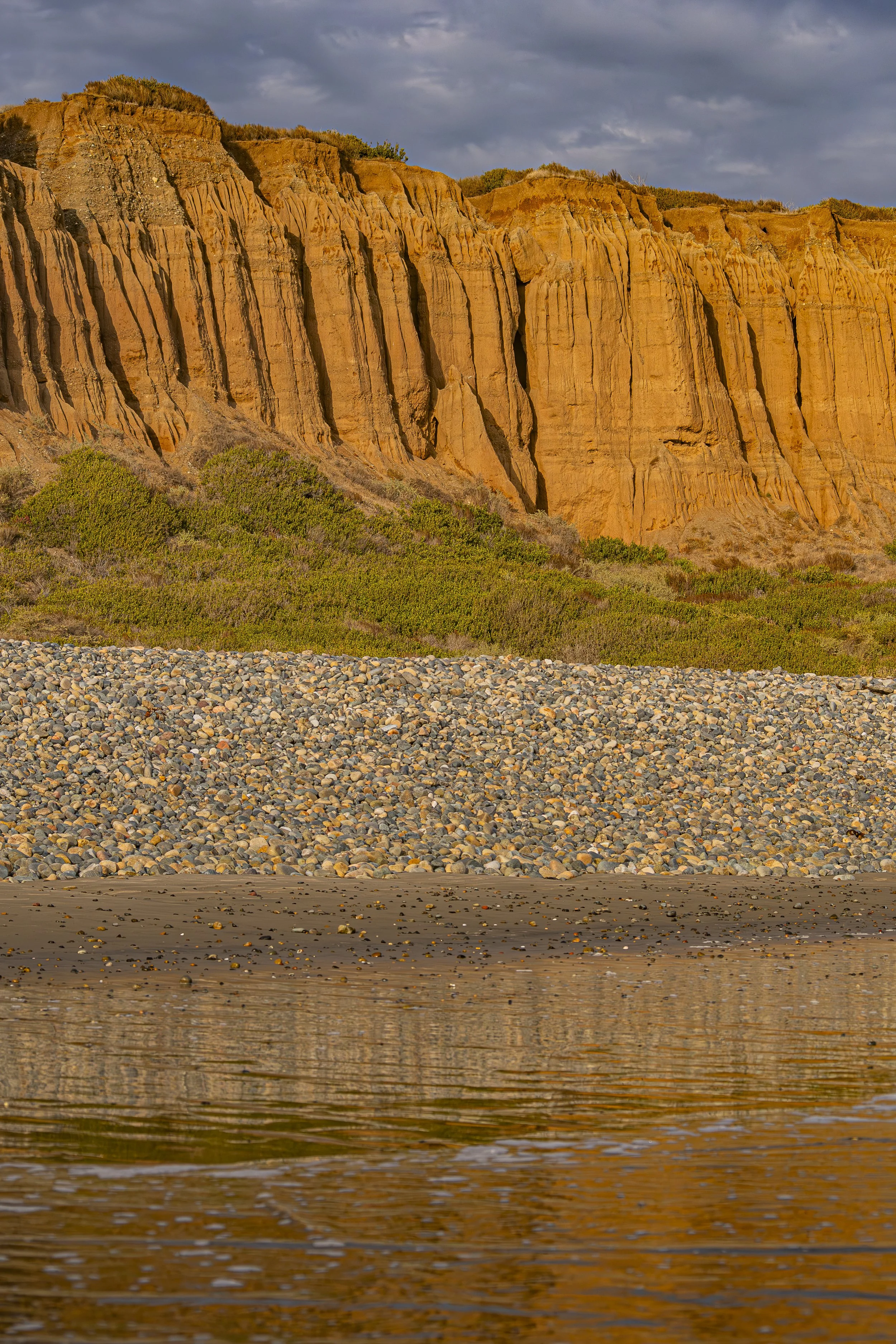 Light doesn't change the cliffs. It changes how we experience them.