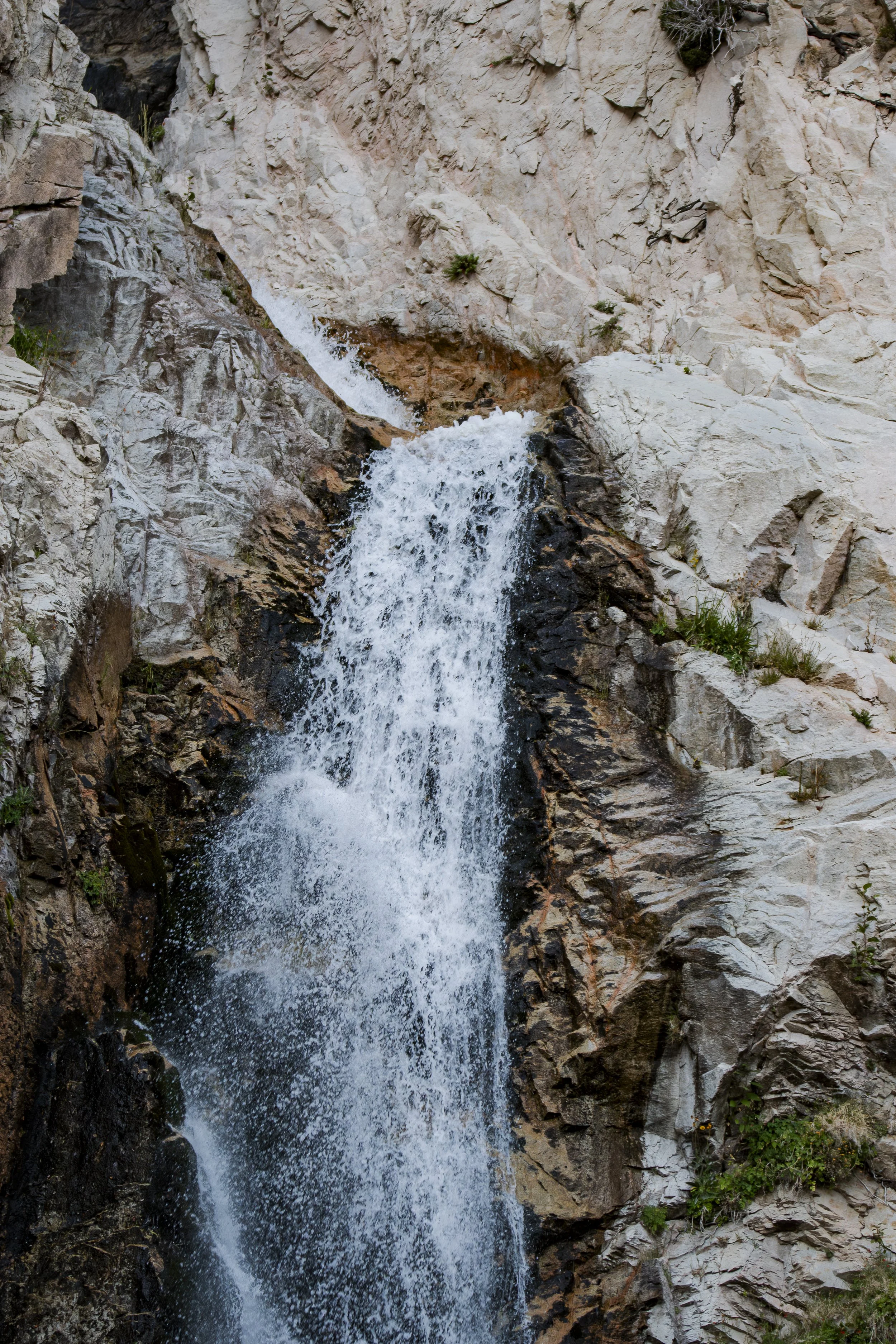 Before looking at the waterfall, notice everything surrounding it. How many different colors can you find in the rock?