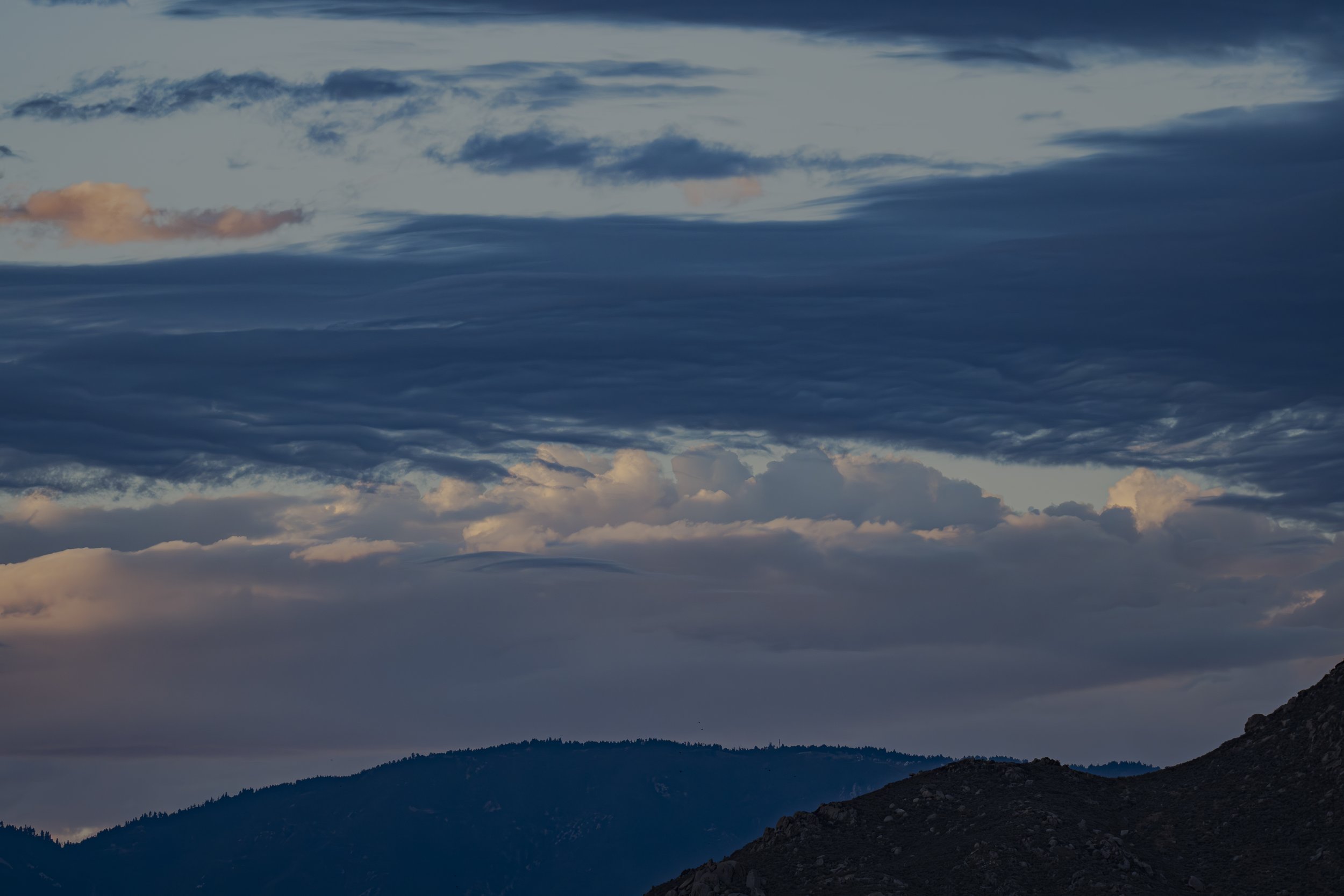Look at the clouds. What shapes do you see?
