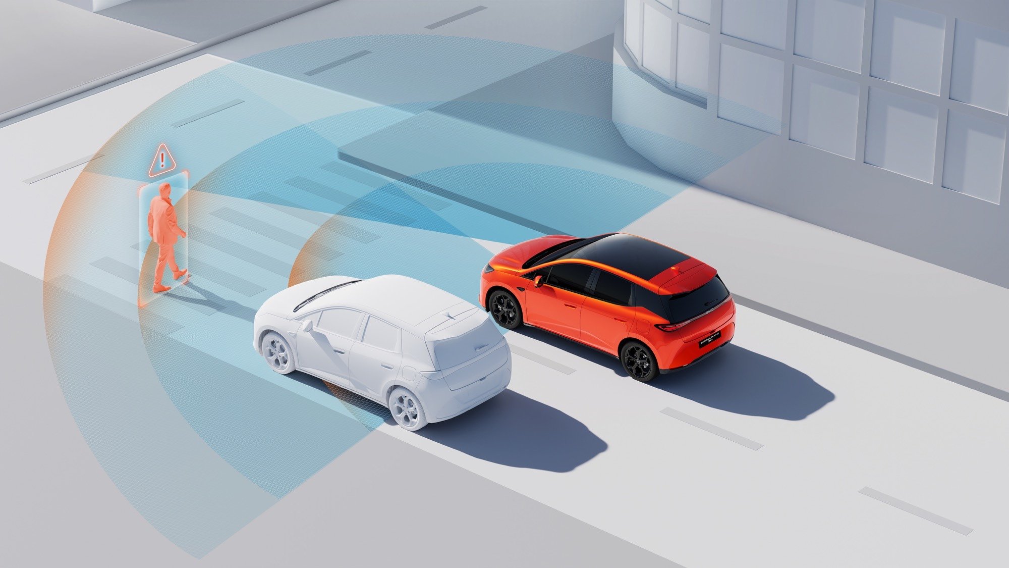 Ilustracja systemu AEB w BYD Dolphin G — automatyczne wykrywanie pieszych i hamowanie awaryjne