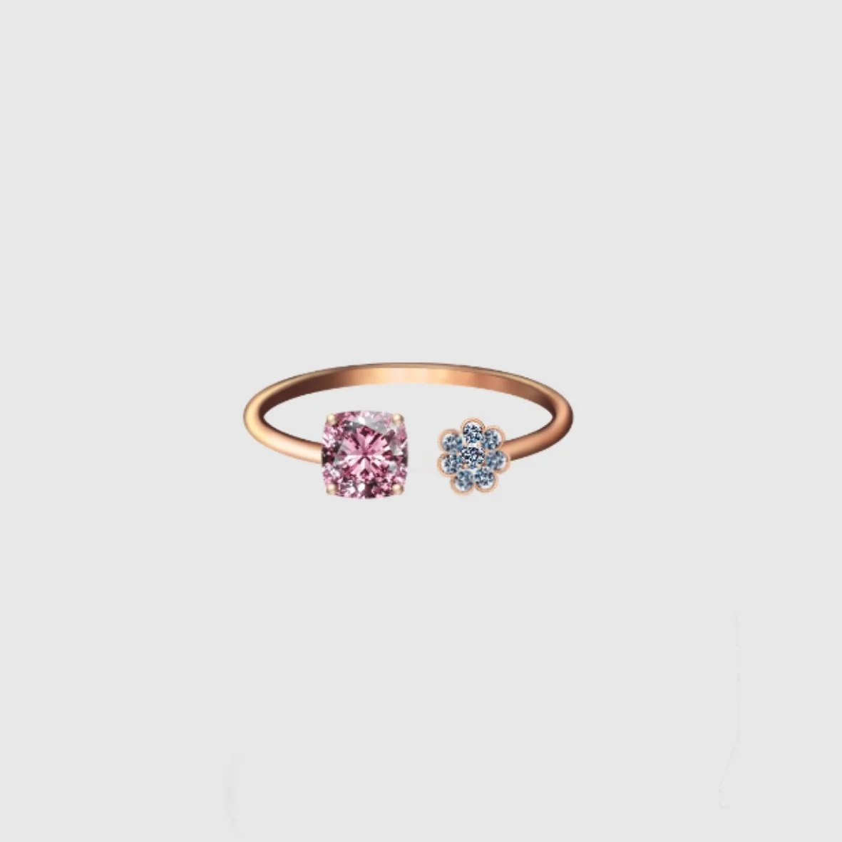 Bague en or rose avec une tourmaline taille coussin et une petite fleur en diamants