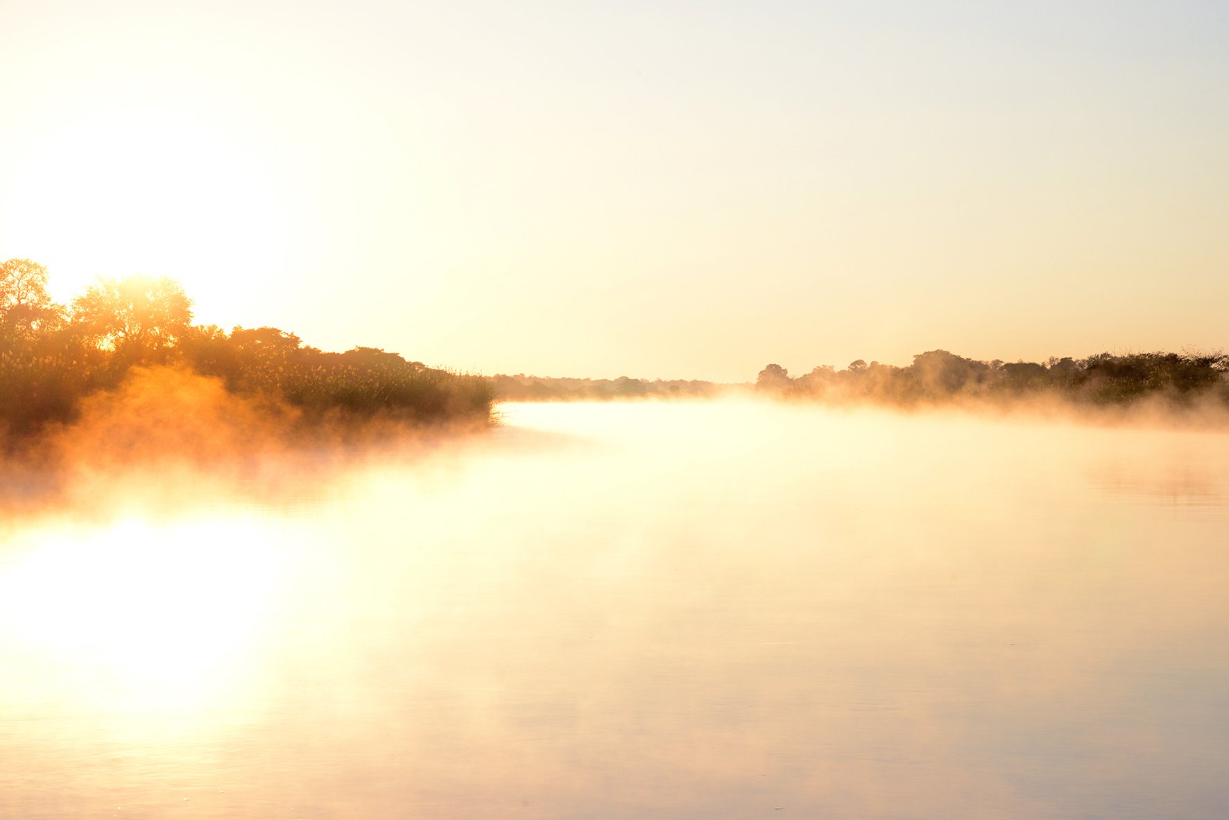 sunrise on the Okavango river