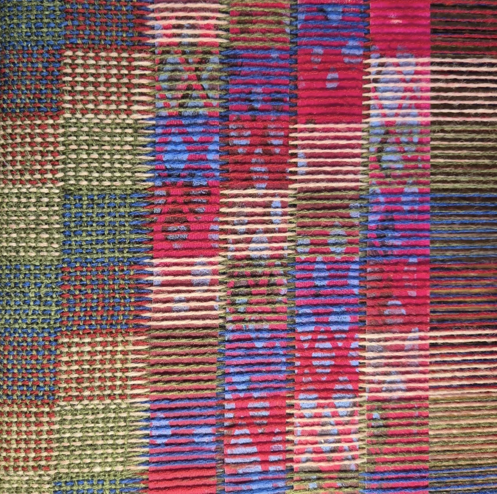 An image of an artwork made out of woven yarn