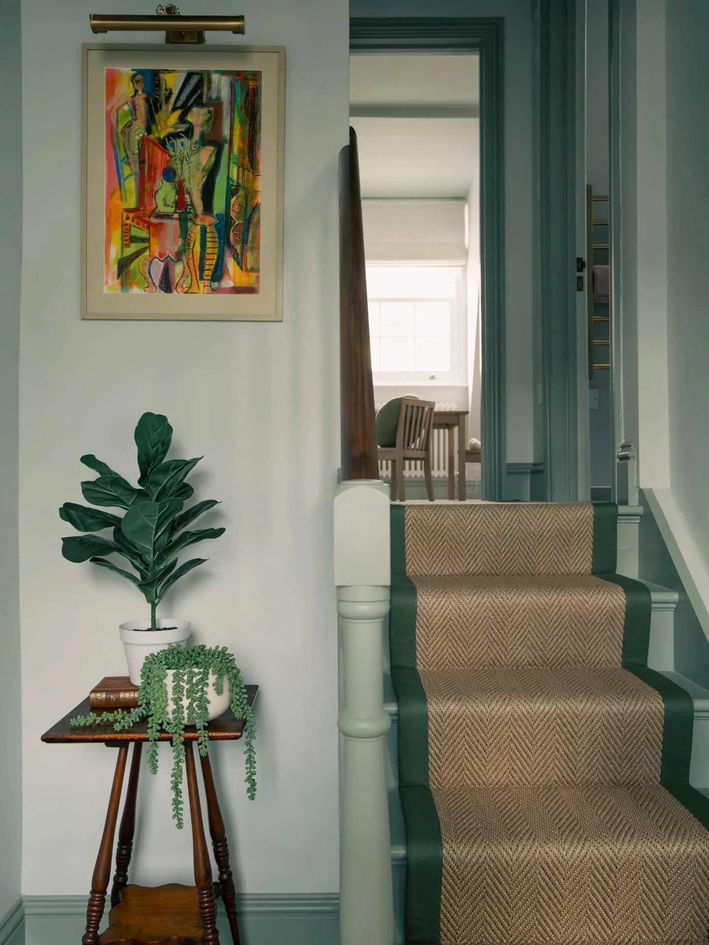 The Hallway

We loved how the original staircase winds its way between the ground and first floors of this townhouse. So, when it came to adding an extension, keeping those traditional details was important but without stretching the budget. 
We conn