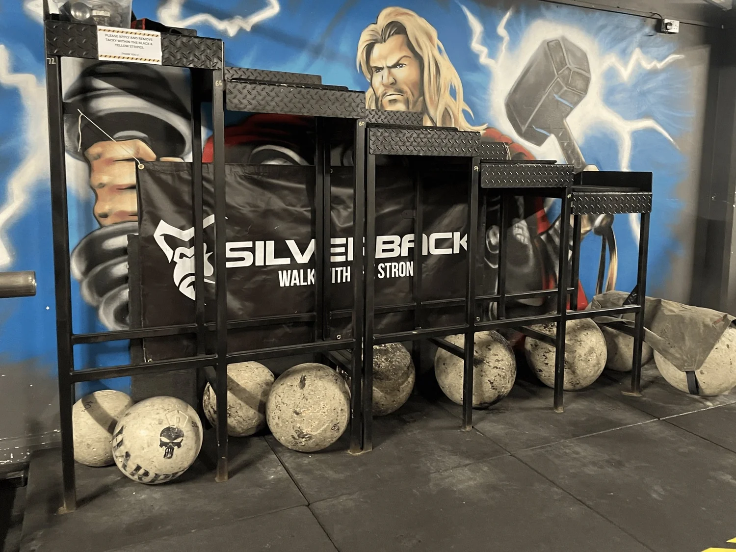 Atlas stones and racks in the strongman area
