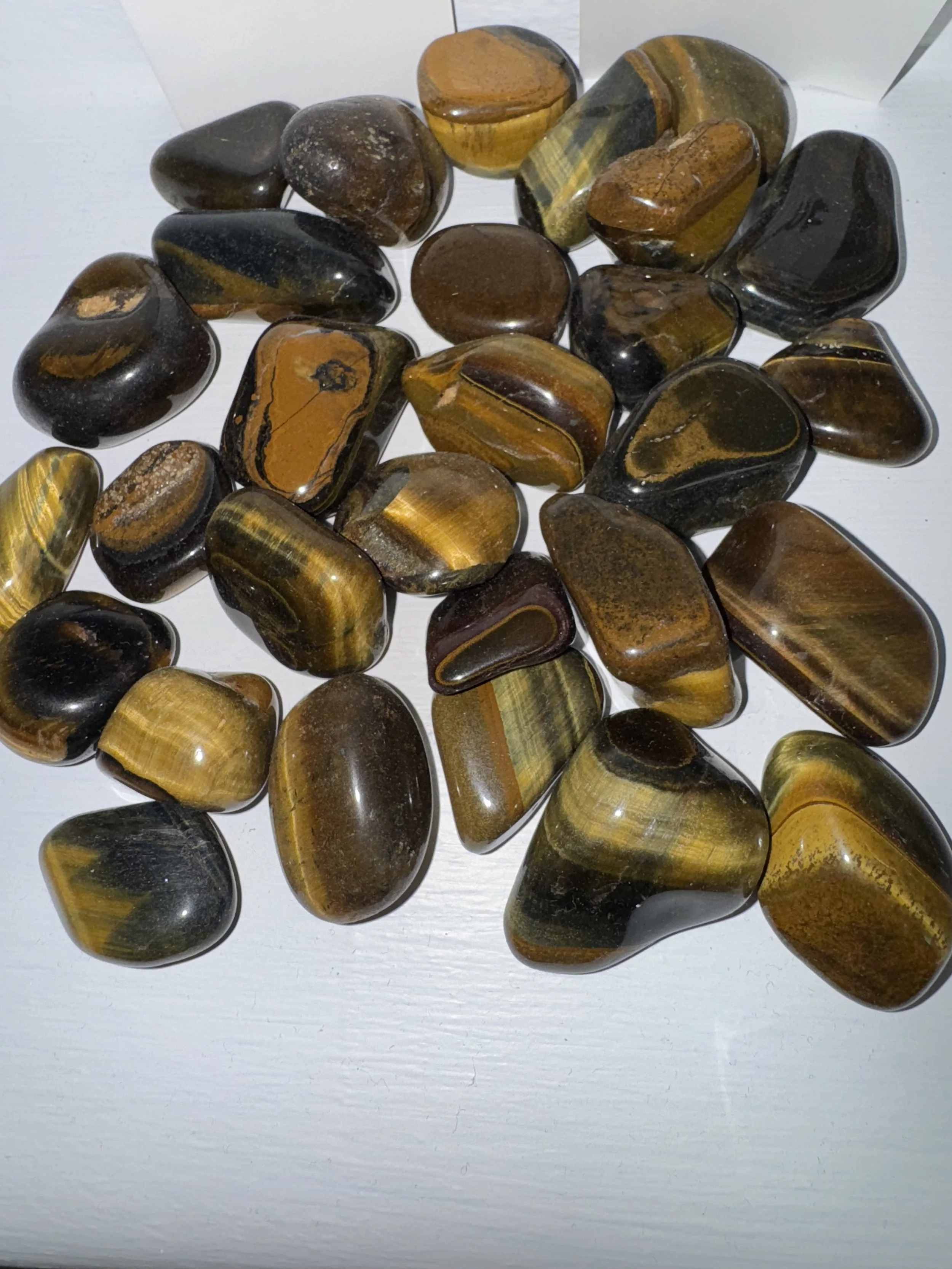 Tigers eye one tumble stone