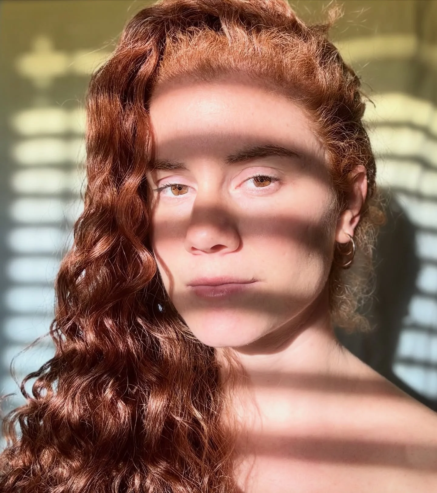 When sunlight pours through a window beautifully. A makeshift beach towel backdrop ~ imagining summer while there&rsquo;s frost outside. 
#selfportrait #goldenlight