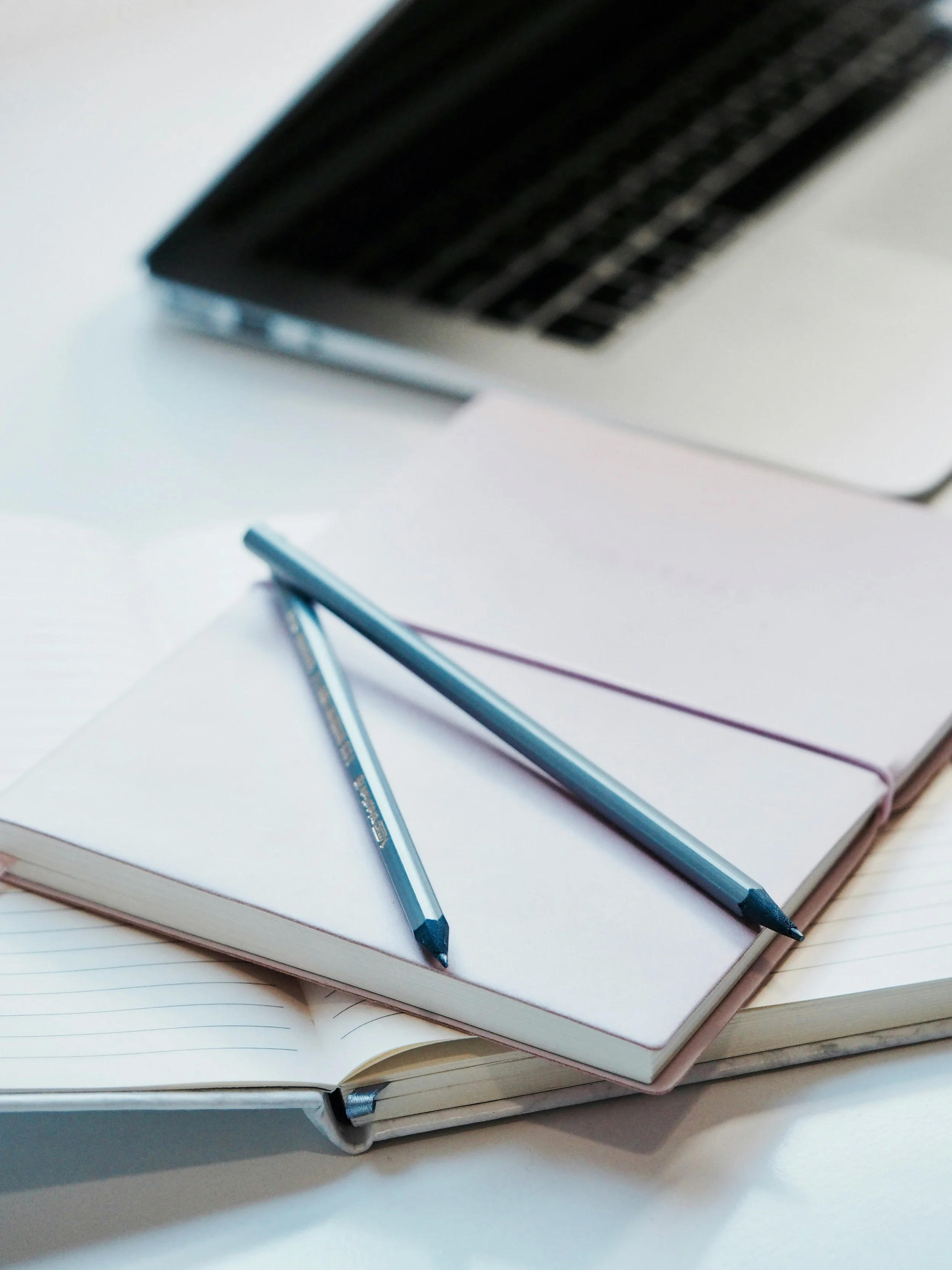 Open Notebook with iPhone and MacBook.jpg