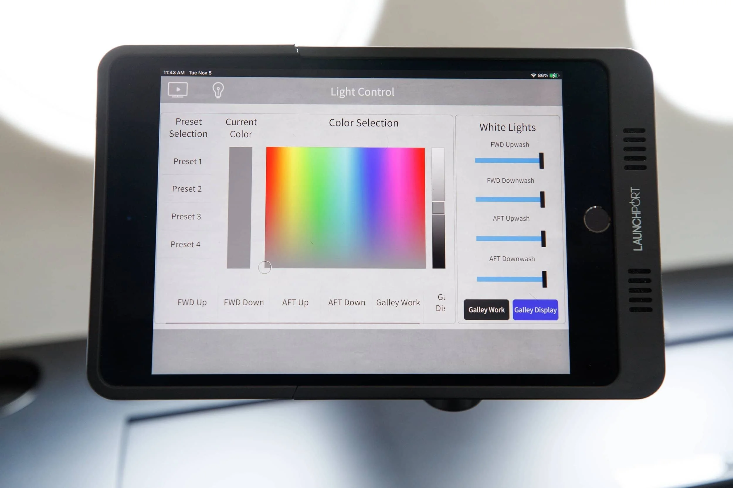 A digital display panel showing a light control interface with color selection and adjustment sliders.