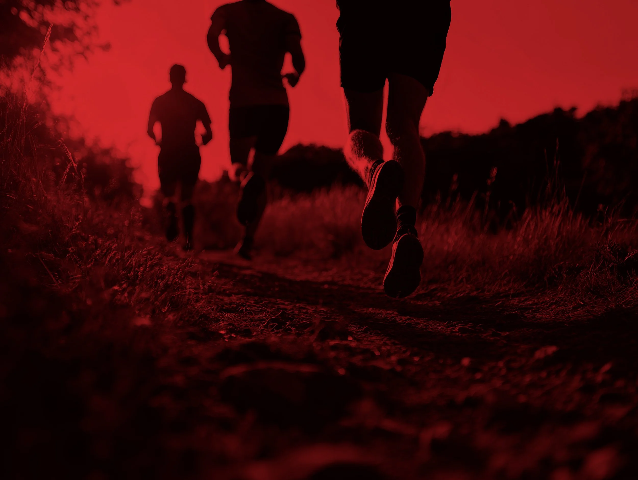 people-running-together-scenic-outdoor-trail red.jpg