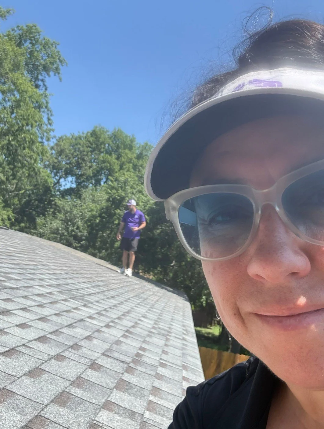 True Bond Roofing owners conducting a residential roof inspection in the Dallas–Fort Worth area.