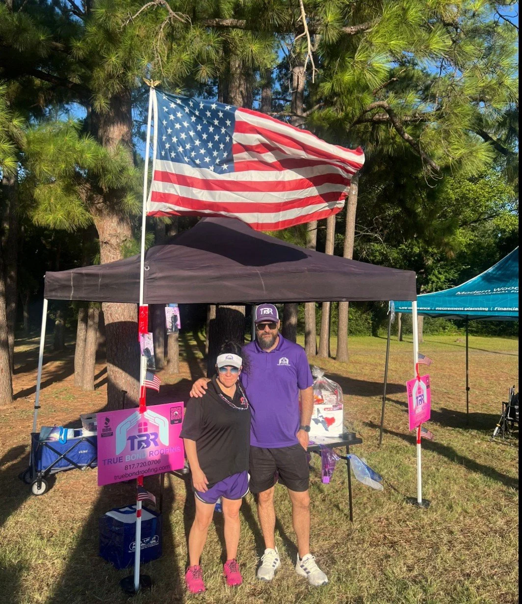 Aaron and Tiffany Lemons, owners of True Bond Roofing in Arlington, Texas, at a local community event.
