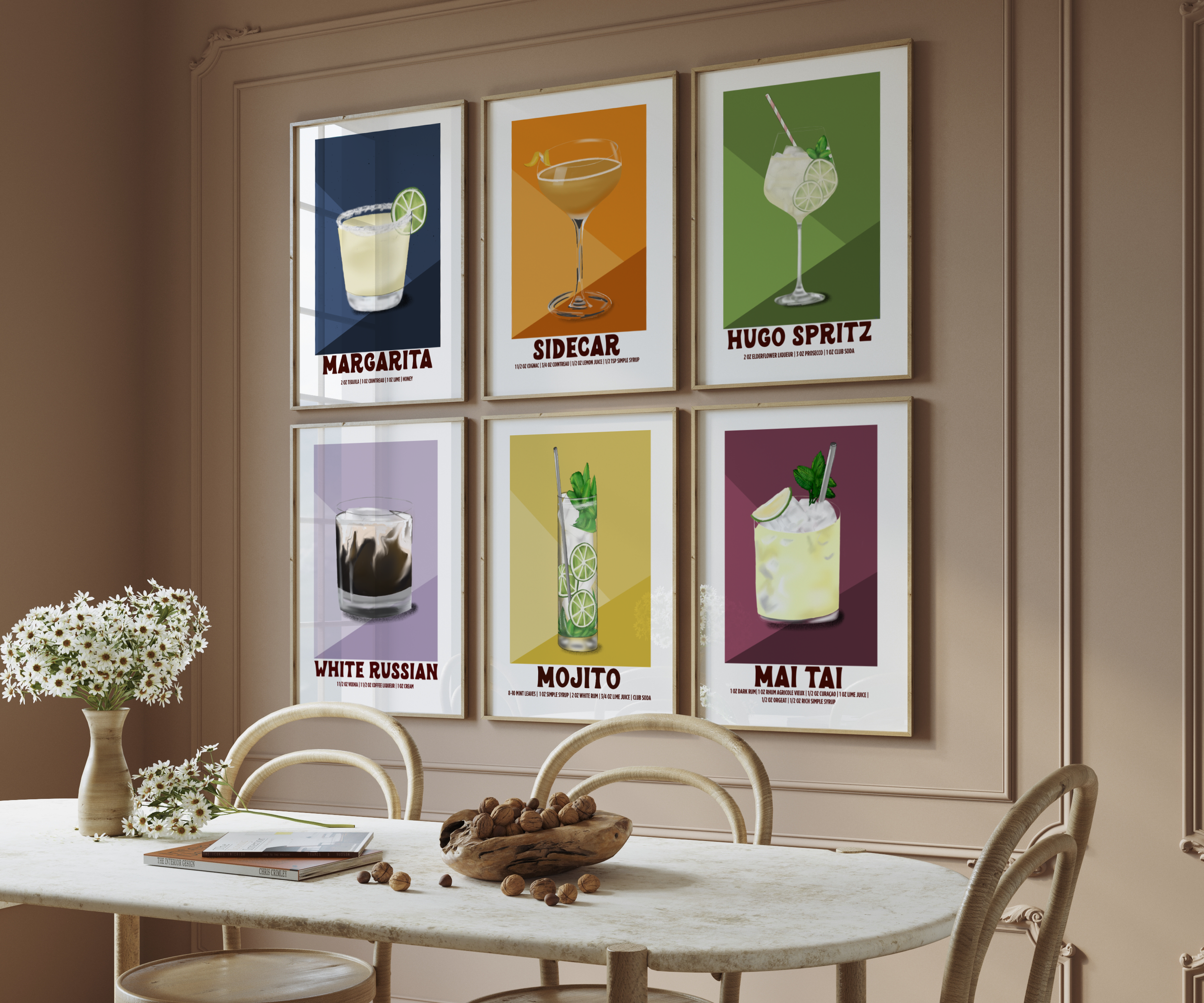 Gallery wall of illustrated cocktail prints including the Hugo Spritz