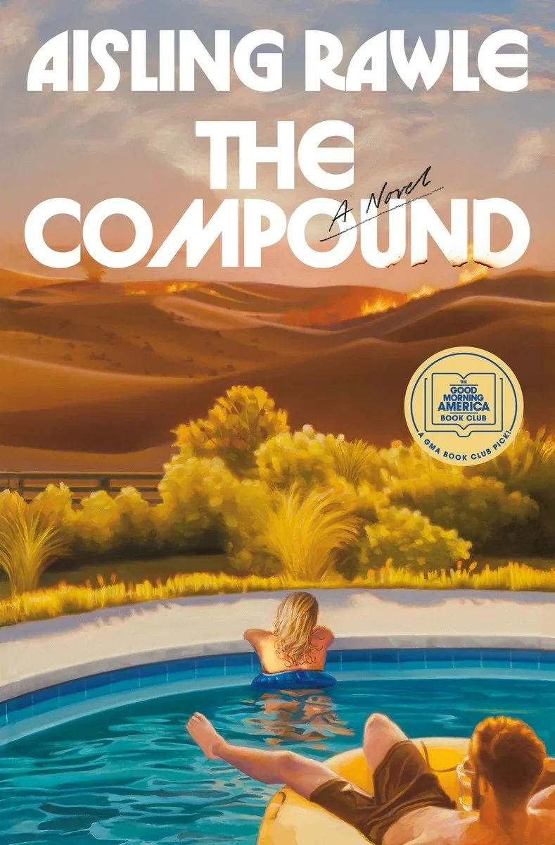 Book cover of The Compound by Aisling Rawle showing a man and woman lounging by a pool with desert mountains and wildfires in the background. A Good Morning America Book Club pick badge is featured.