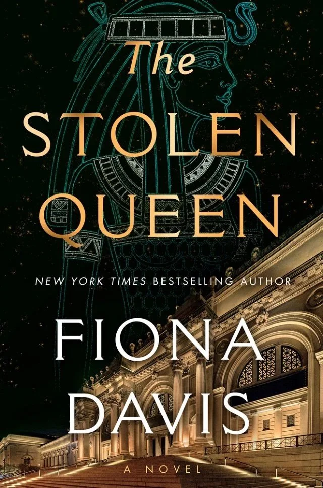 Cover of The Stolen Queen by Fiona Davis, featuring an illuminated museum facade beneath an outlined illustration of an Egyptian queen against a dark background