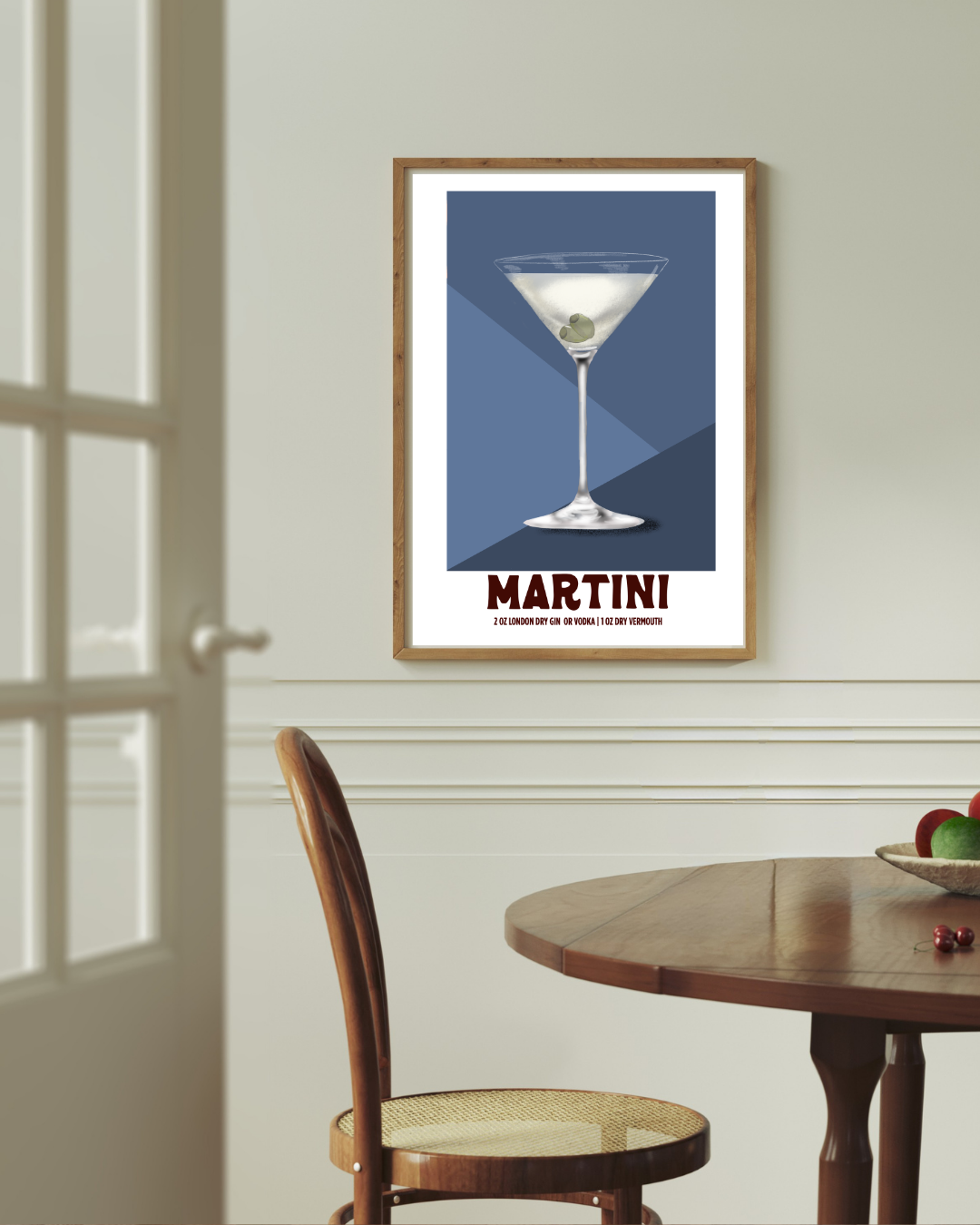 Martini cocktail art print styled above a dining room table