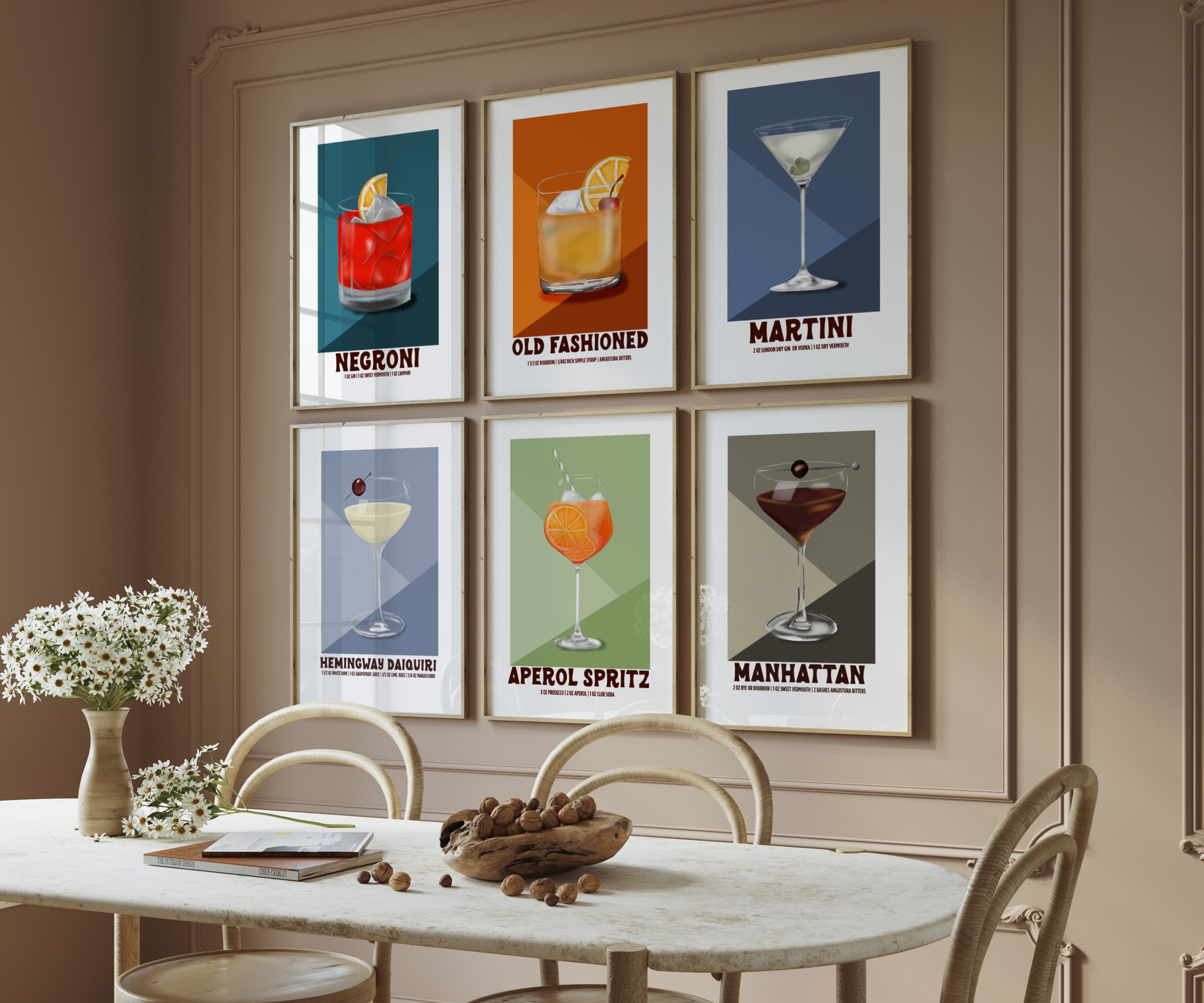 Gallery wall of illustrated cocktail prints including the Martini